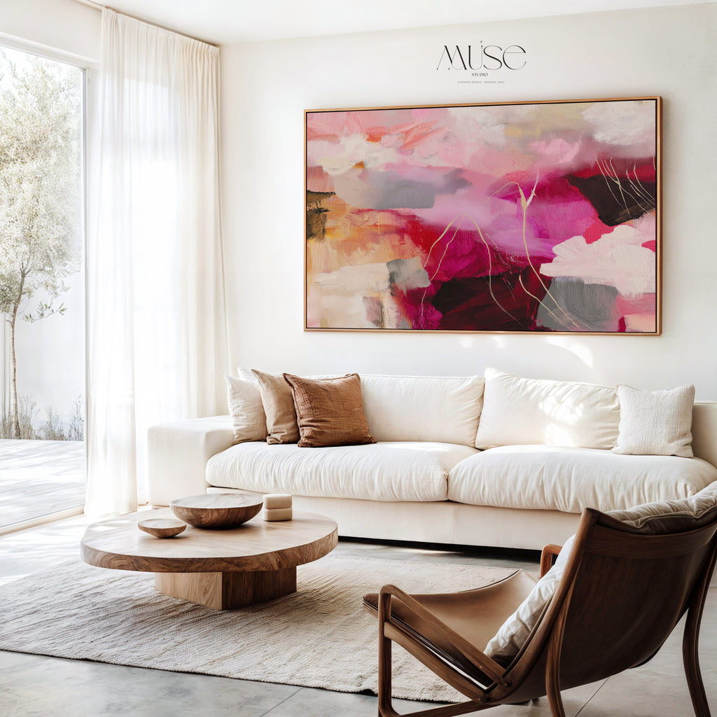 Large Autumn Abstract Wall Art in a Bright Living Room — Autumn Blush No. 514a hanging above a neutral sectional in a bright living room with natural wood accents.