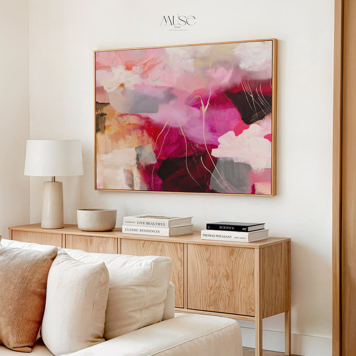 Framed Autumn Abstract Wall Art in a Modern Living Room — Autumn Blush No. 514a in a light wood frame displayed in a modern dining area with warm, soft lighting.