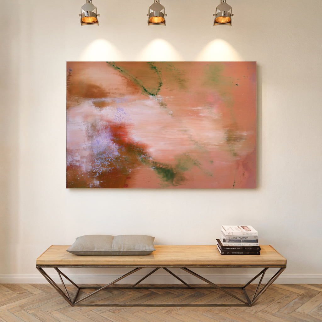 Large autumnal abstract canvas wall art illuminated by overhead gallery spotlights, hung above a low wooden bench credenza on herringbone parquet flooring.