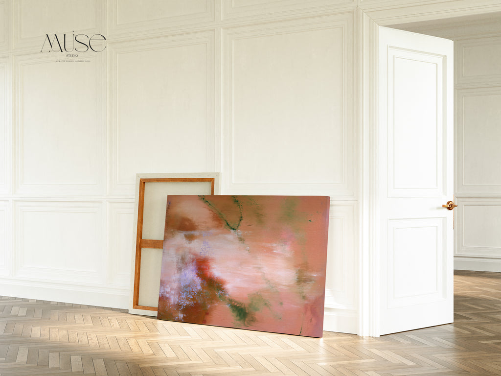 Large stretched organic abstract canvas leaning against a white wainscoted hallway wall near an open doorway on light parquet floors.