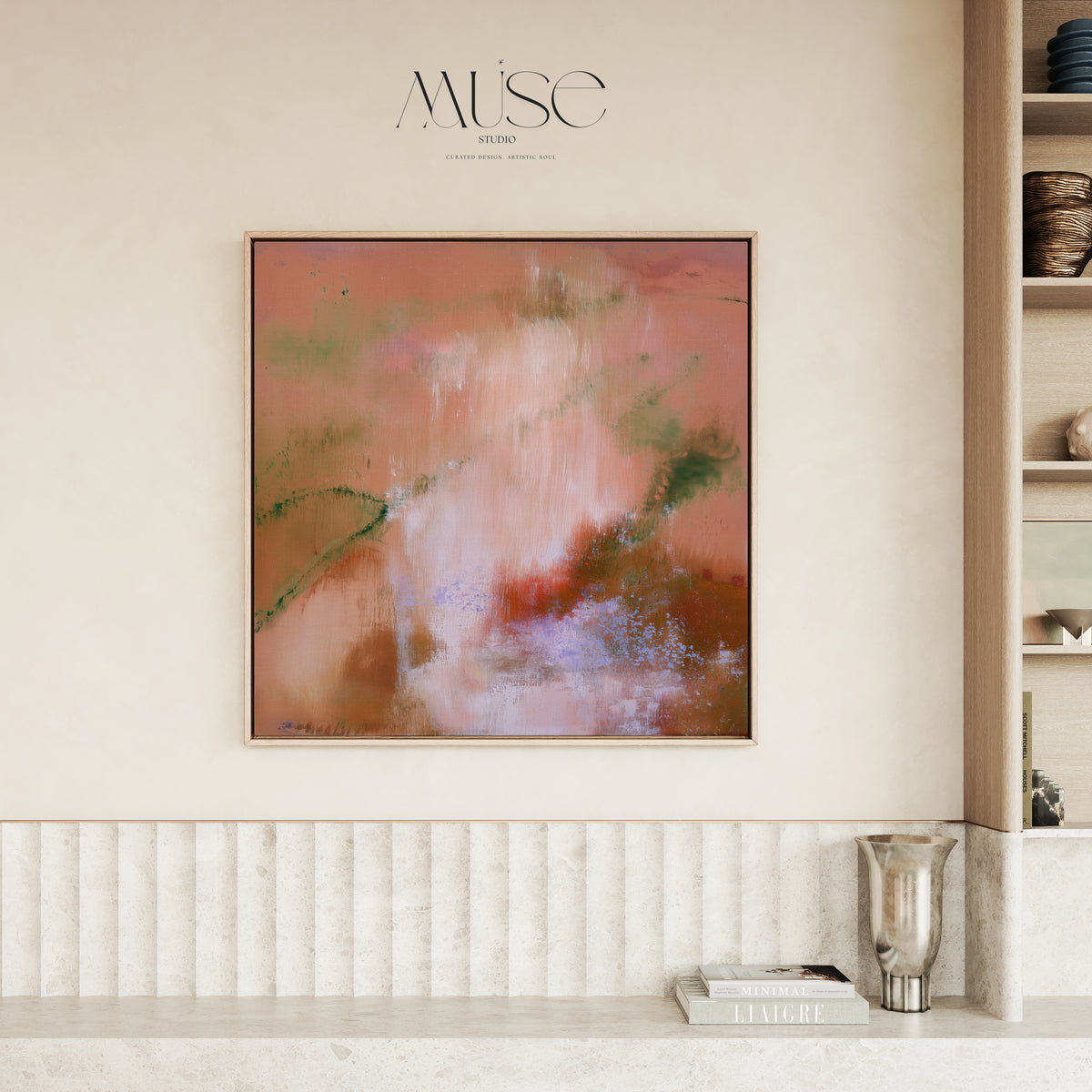 Square framed autumnal abstract wall art hung above white fluted paneling in a warm minimalist living room setup.