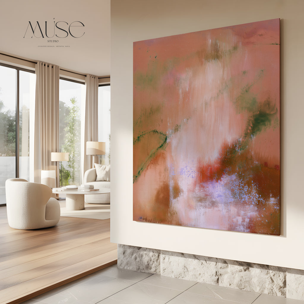 Oversized square earthy abstract canvas displayed above a stone wall ledge in a modern luxury living room with a curved ivory armchair and floor-to-ceiling windows.