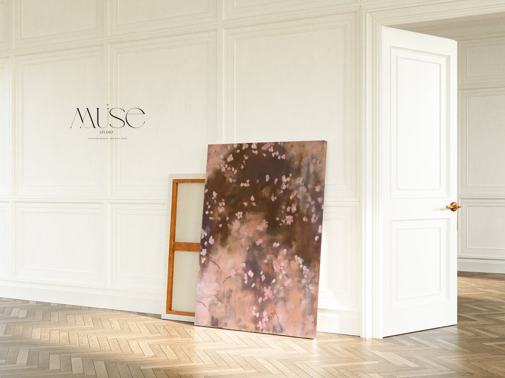 The Dawn Nocturne No. 1123 gallery-wrapped canvas leans against a white wall with classic boiserie molding on a herringbone wood floor in an elegant Parisian-style apartment.