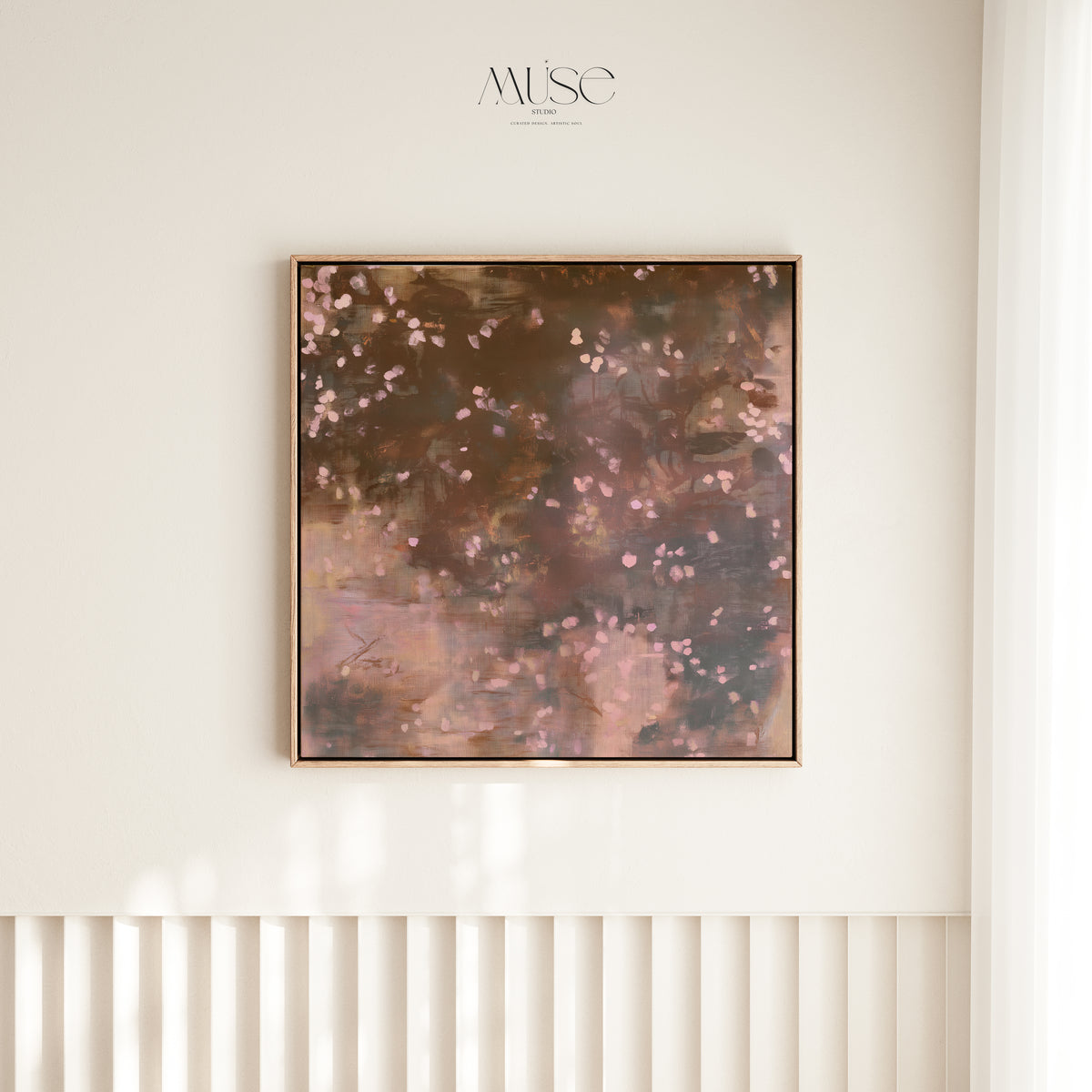 Framed square canvas art, earthy brown moody botanical print Oaken Petal No. 1124 styled above white vertical wall paneling in a serene, light-filled interior