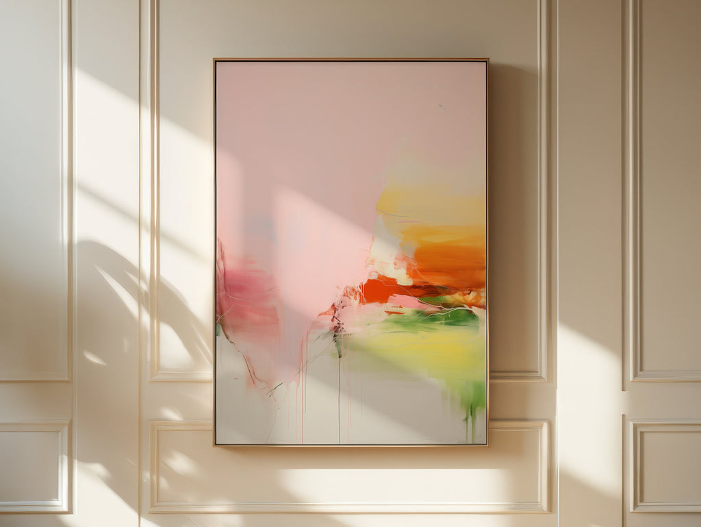 Vertical abstract wall art featuring soft blush pink, vibrant orange, and muted green tones displayed on a clean white wall. Light pastel contemporary canvas ideal for bright living rooms, bedrooms, or warm minimalist interiors. Available as framed wall art or canvas by Muse Studio.