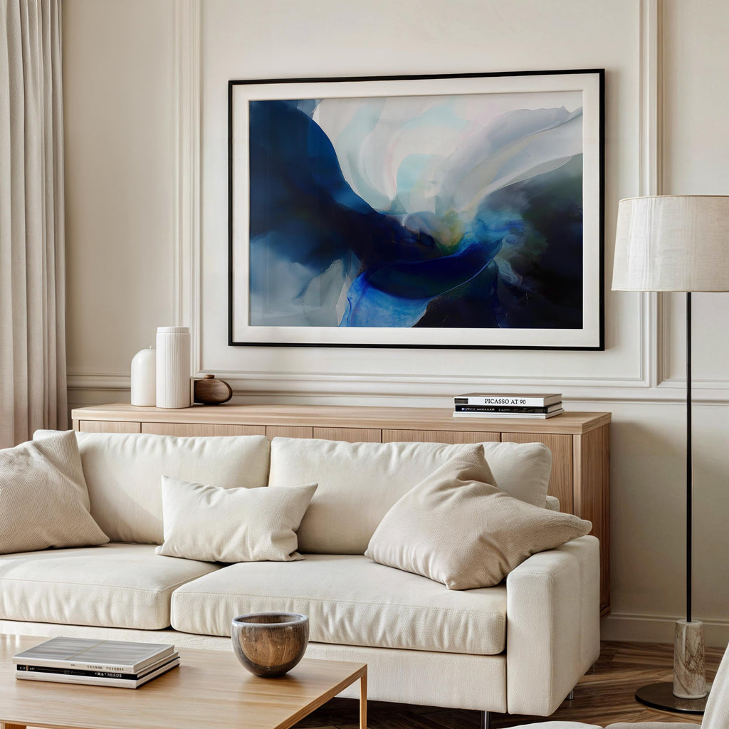Horizontal abstract wall art in deep navy, misty teal, and soft blue tones, painted in a fluid, ocean-inspired style. Designed for moody, modern spaces and perfect for living rooms, bedrooms, or office walls. Available as a fine art poster or canvas wall art for curated, color-forward decor.