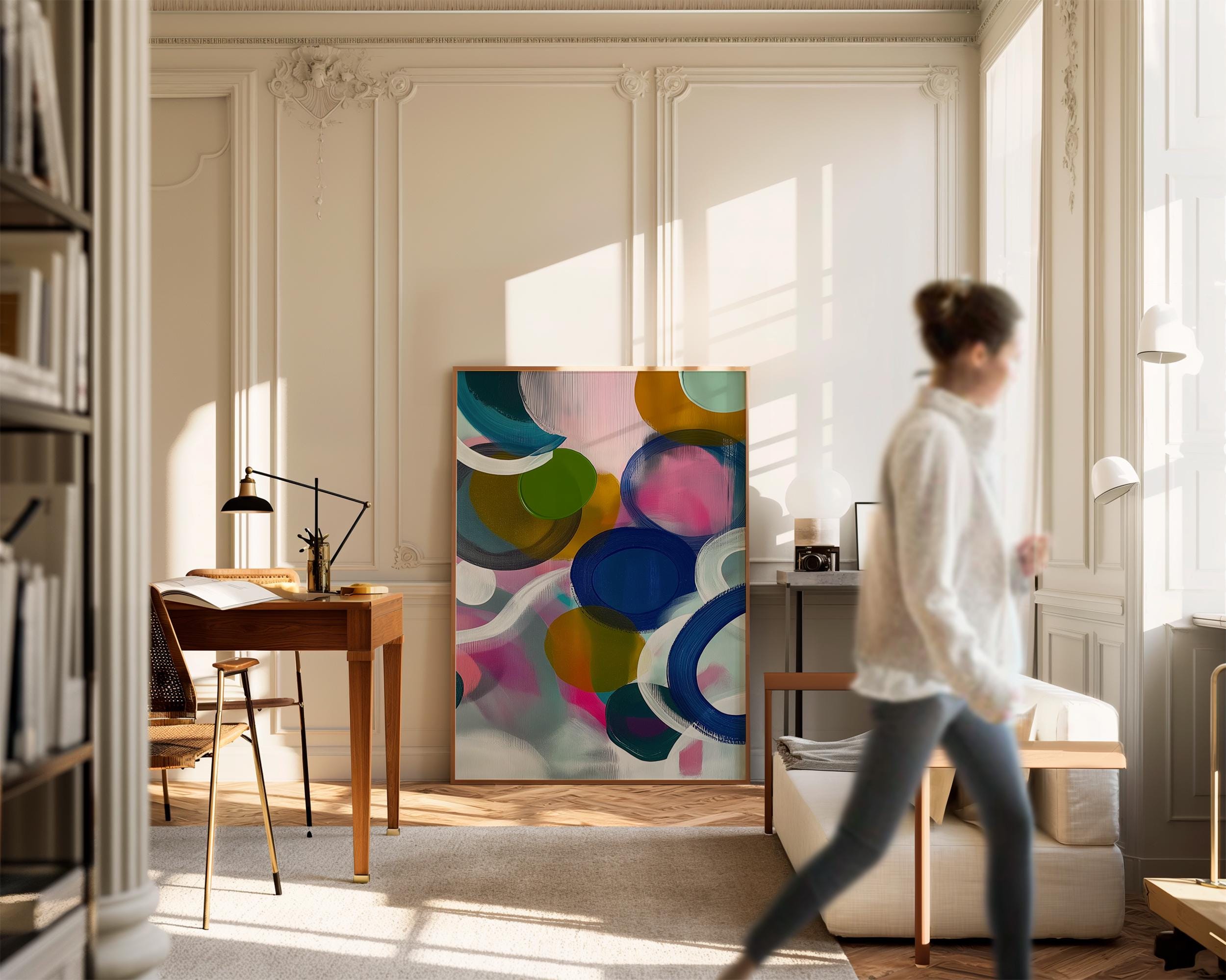 Large square abstract wall art featuring bright pink, blue, and green tones in a bold color pop composition, printed as large canvas wall art and styled in a modern living room to create an energetic statement focal point.