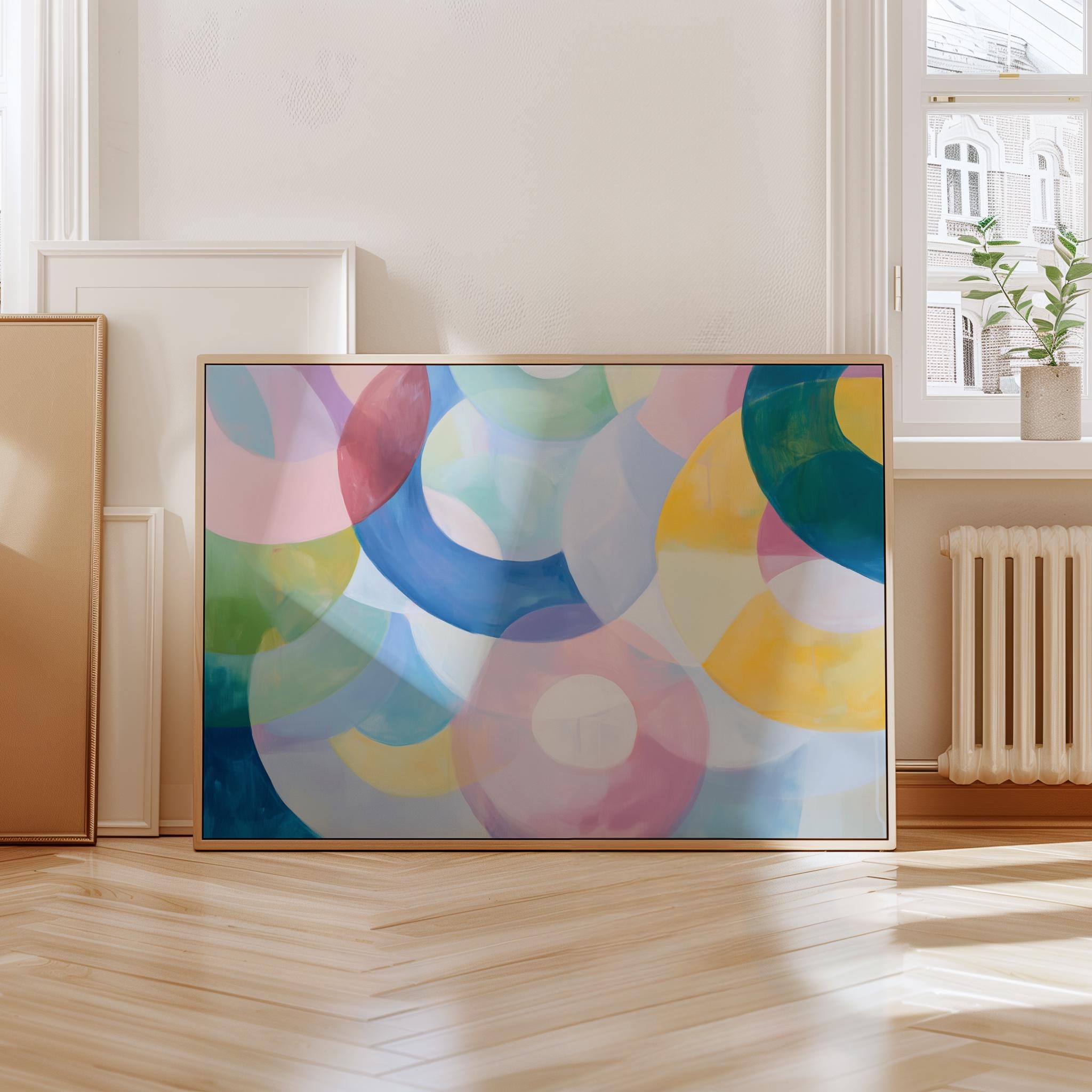 Kaleidoscope No. 401 by Muse Studio & Co. pastel abstract wall art print with soft pink, blue, and multicolor circles, printed with museum-grade giclée inks on premium artist paper, styled as playful colorful decor in a kids room or nursery.