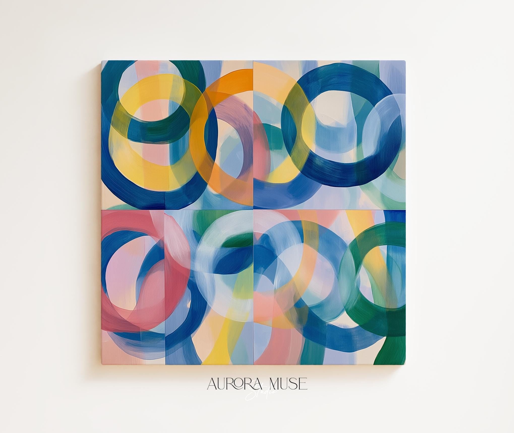 Square geometric abstract canvas wall art with overlapping teal, yellow, coral, and navy rings in a bold color-pop style. Ideal for living rooms, offices, or modern interiors. Available as gallery-wrapped or floating framed canvas by Muse Studio, artwork 410.