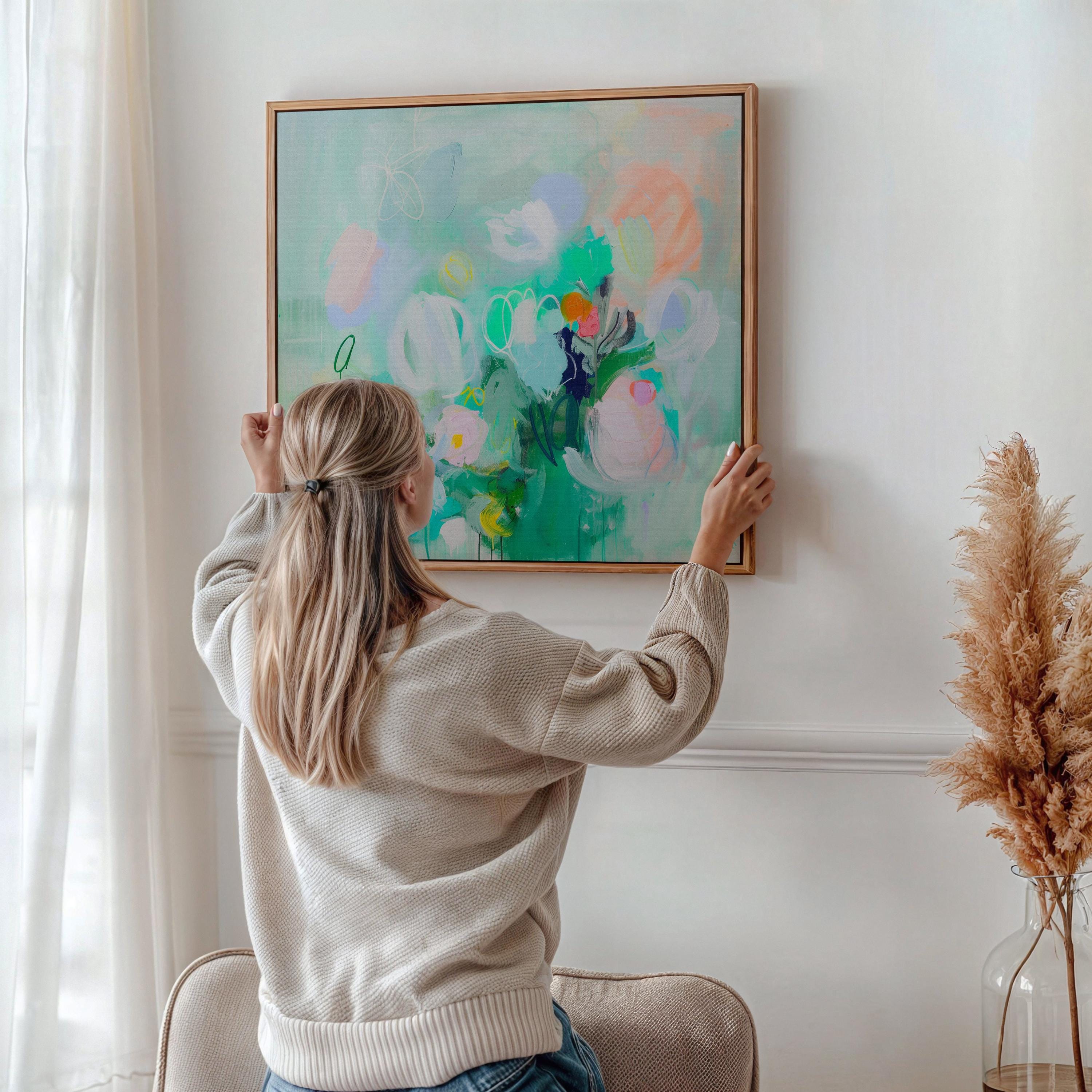Aqua Bloom No. 374 by Muse Studio & Co. pastel abstract wall art in aqua and blush with soft botanical floral movement, square canvas wall art printed with museum-grade giclée inks on premium gallery-wrapped canvas, available as stretched or rolled canvas or framed, styled as calming modern decor in a nursery or bedroom.