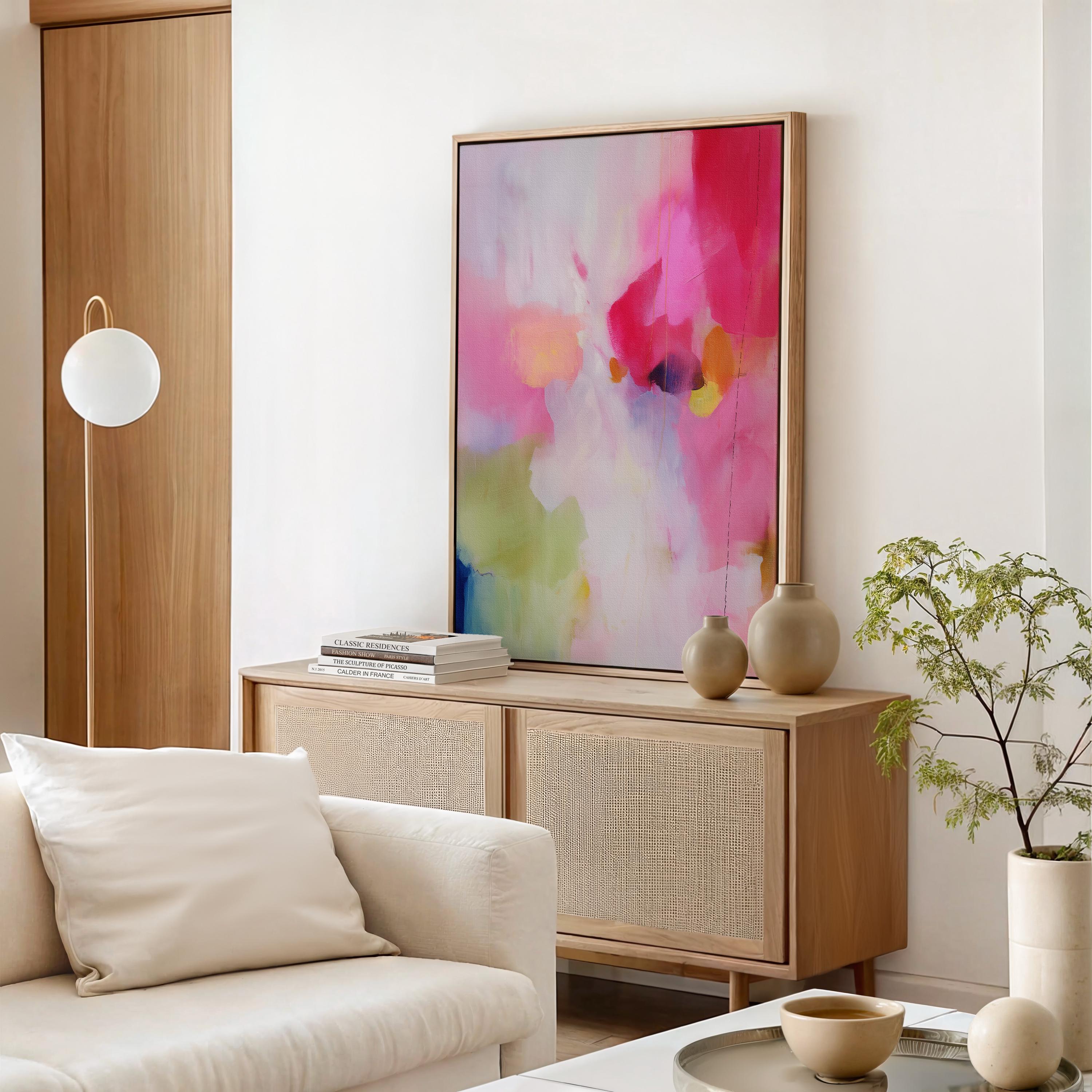 Colorful abstract wall decor styled in a modern neutral home. Large statement wall art displayed in living room, bedroom, or office spaces. Vibrant canvas or giclée decor art adds bold visual impact to contemporary interiors, ideal for home staging, office design, and curated spaces. Muse Studio Decor Art. Soft Contemporary Framed Wall Art Vertical Abstract Canvas Giclée Print in Pink Soft Green Modern Art for Office or Bedroom Decor | 434