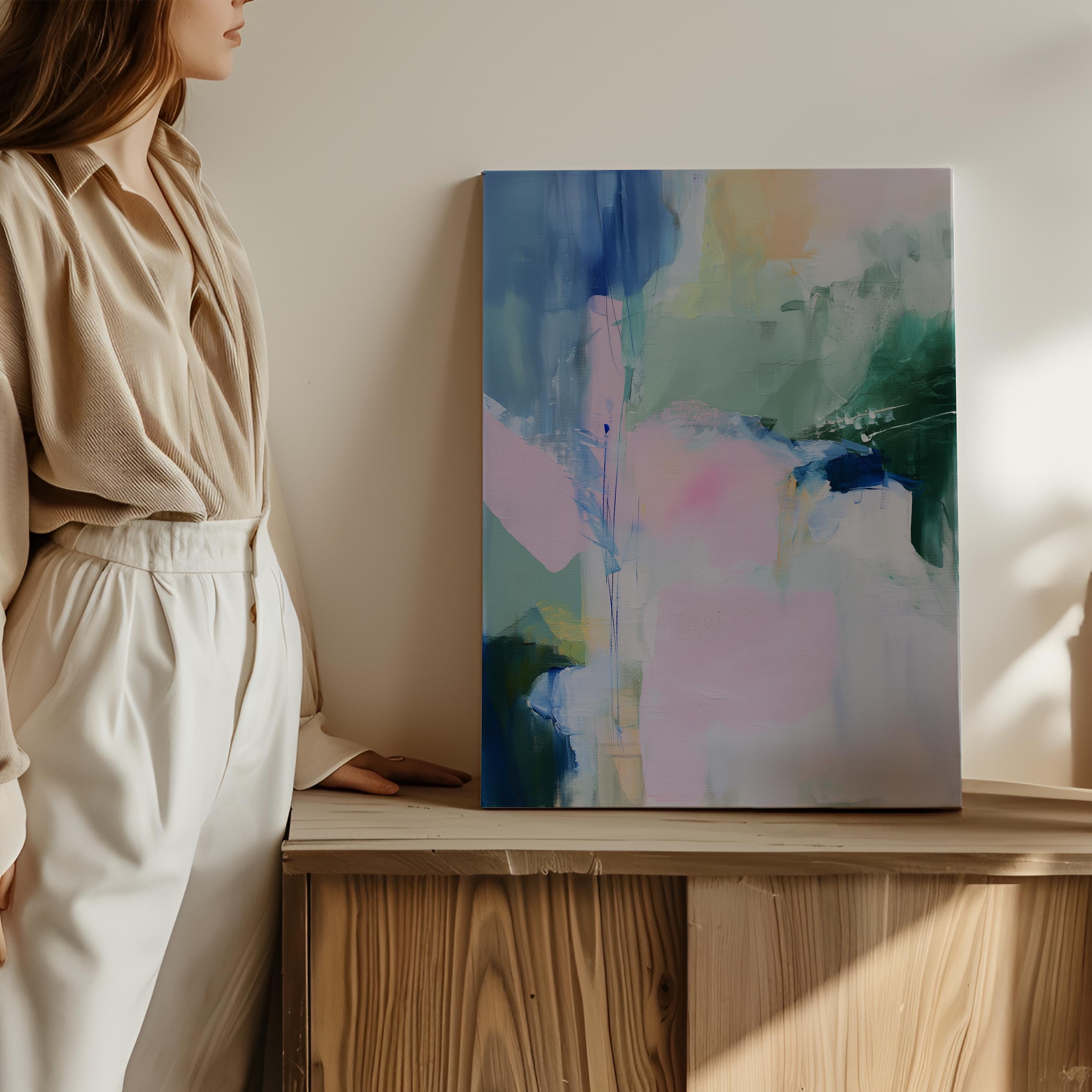 Floral abstract canvas art print by Muse Studio featuring soft blue, green, and pink botanical-inspired brushwork on premium gallery-wrapped artist canvas with museum-grade giclée inks. Vertical wall decor styled for bedrooms, living rooms, offices, nurseries, and soft pastel cottage or modern floral interiors.
