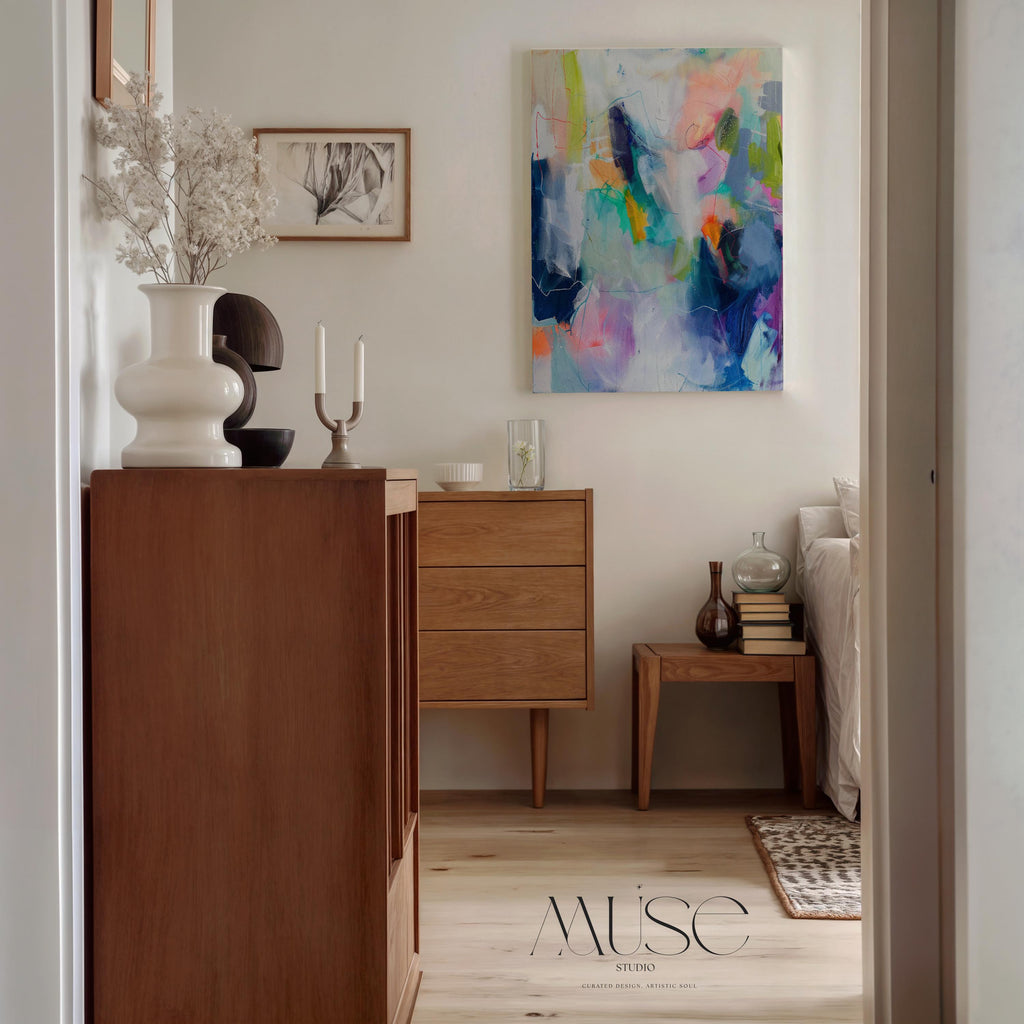 Colorful abstract wall art staged in modern neutral home decor. Large statement art print displayed in living room, bedroom, or office space. Vibrant canvas or giclée print adds bold style to contemporary interiors, perfect for home decor, office staging, and design projects. Muse Studio Decor Art.