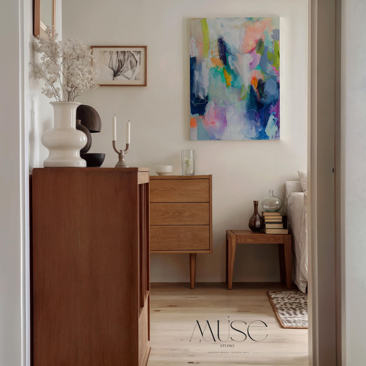 Colorful abstract wall art staged in modern neutral home decor. Large statement art print displayed in living room, bedroom, or office space. Vibrant canvas or giclée print adds bold style to contemporary interiors, perfect for home decor, office staging, and design projects. Muse Studio Decor Art.