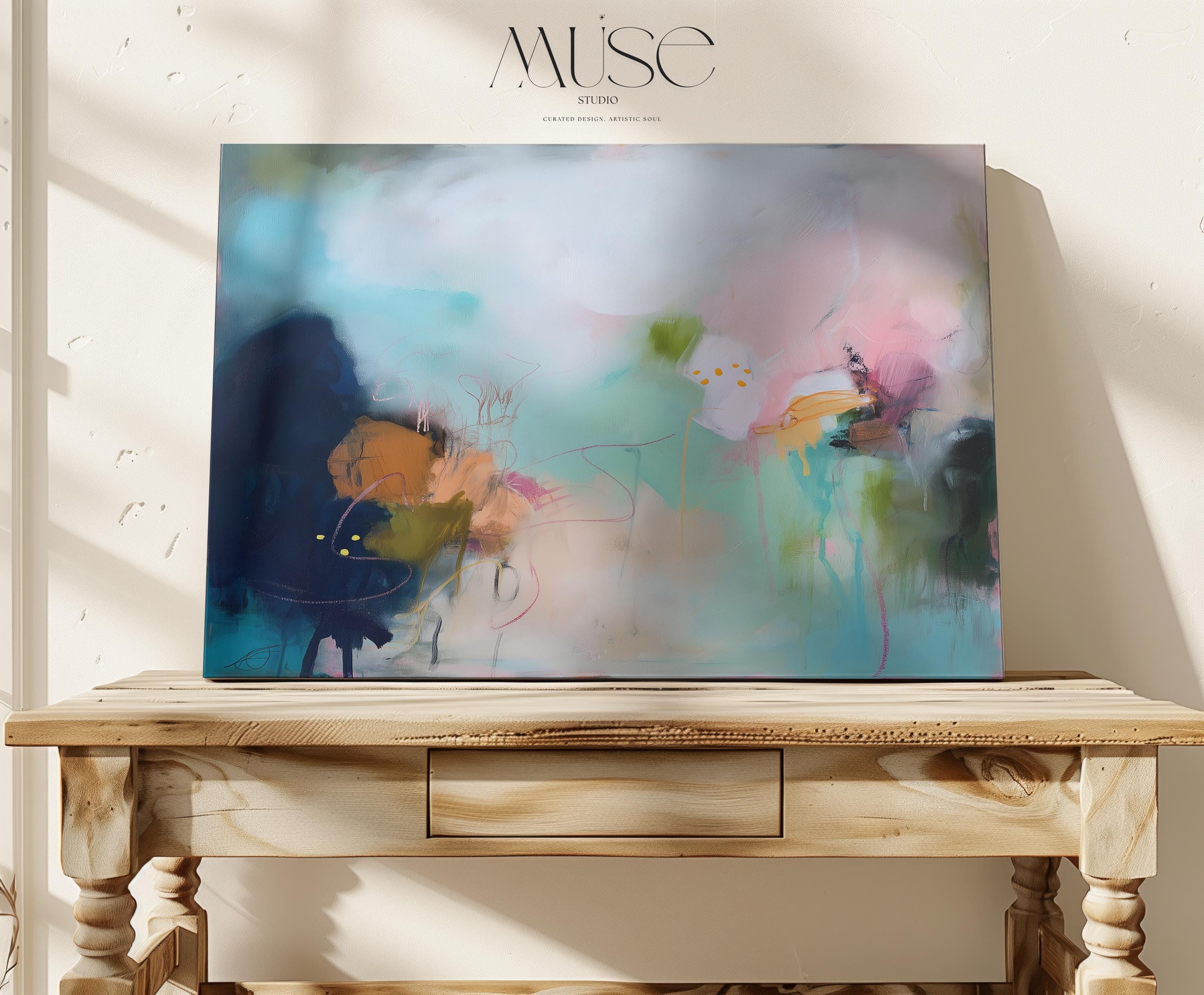 Coastal abstract wall art by Muse Studio featuring aqua, blush pink, moss green, peach, and inky blue painterly layers with delicate linework and a surreal ocean-garden composition. Coral Gardens No. 428 is styled for serene minimal ocean decor, modern bedroom wall art, living room canvas decor, and creative studio spaces, printed with museum-grade giclée inks on premium gallery-wrapped artist canvas with framed canvas options.