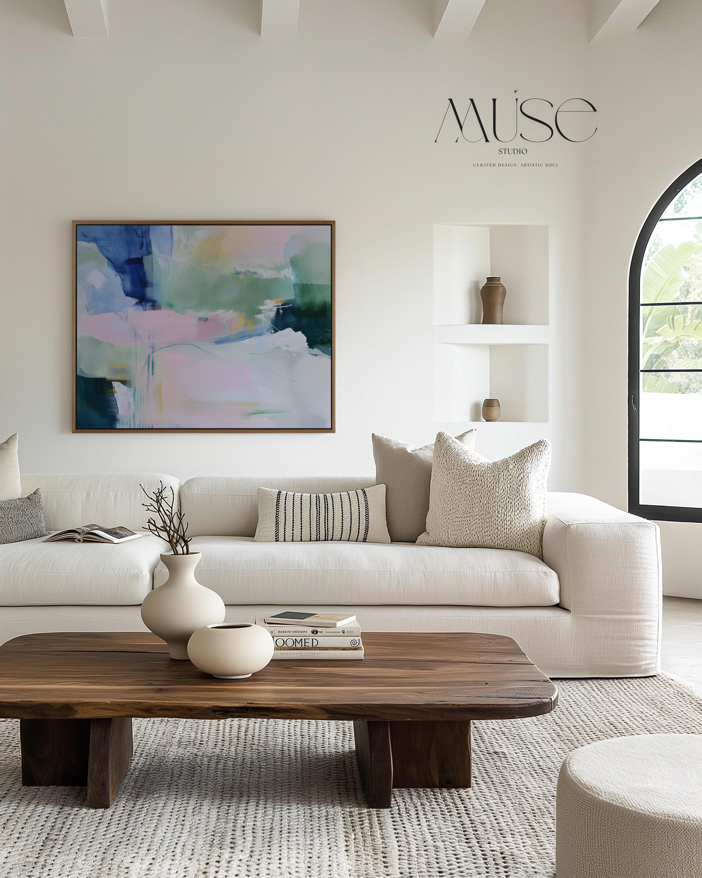 Drifting Dreams No. 422 by Muse Studio & Co. colorful abstract wall art in blue, green, and blush pink, large horizontal canvas printed with museum-grade giclée inks on premium gallery-wrapped canvas. Staged in modern neutral decor as a statement piece for living room, bedroom, or office interiors.
