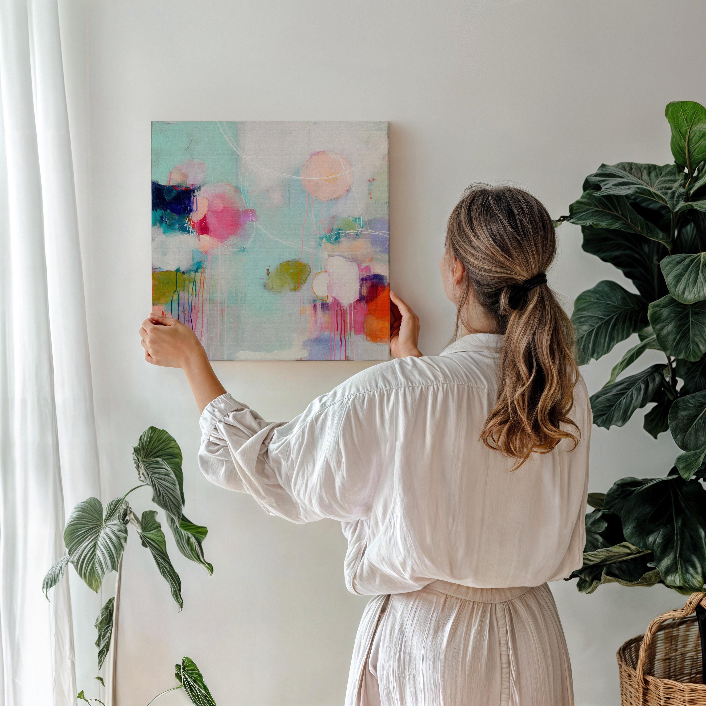Large horizontal oversized abstract canvas wall art by Muse Studio featuring vibrant pink, aqua, and citrus tones, printed with museum-grade giclée inks on premium artist canvas and hand-stretched over solid wood bars for gallery-quality presentation in living room and office interiors.