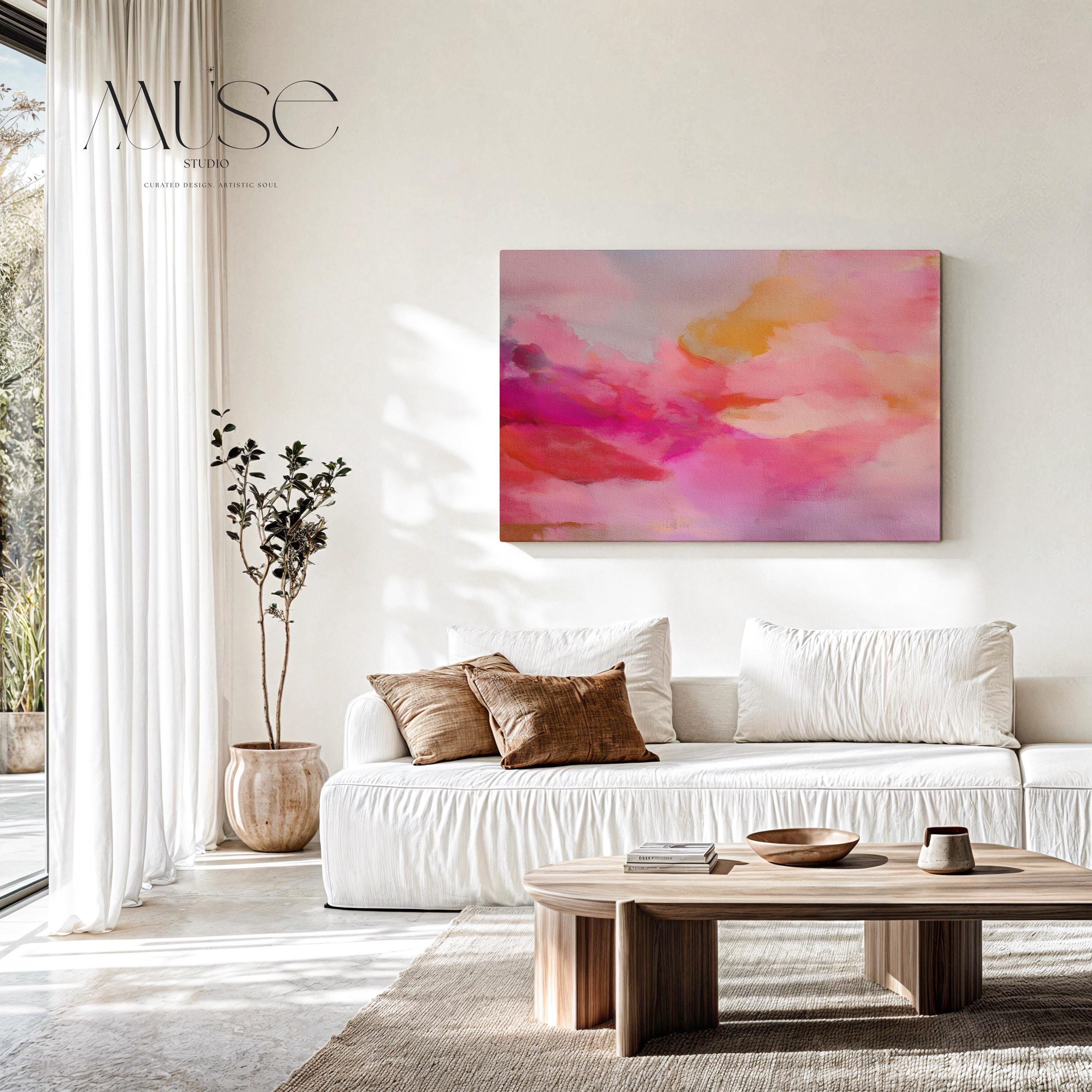 Large horizontal stretched canvas wall art in soft pink, golden orange, and warm blush tones. Features an abstract pastel cloudscape with painterly textures. Ideal for dreamy bedrooms, cozy studios, or soft contemporary interiors. Offered as gallery-wrapped canvas or with optional wood floating frame. From the Pink & Blush Wall Art collection by Muse Studio. Available in multiple large-format sizes for statement decor.