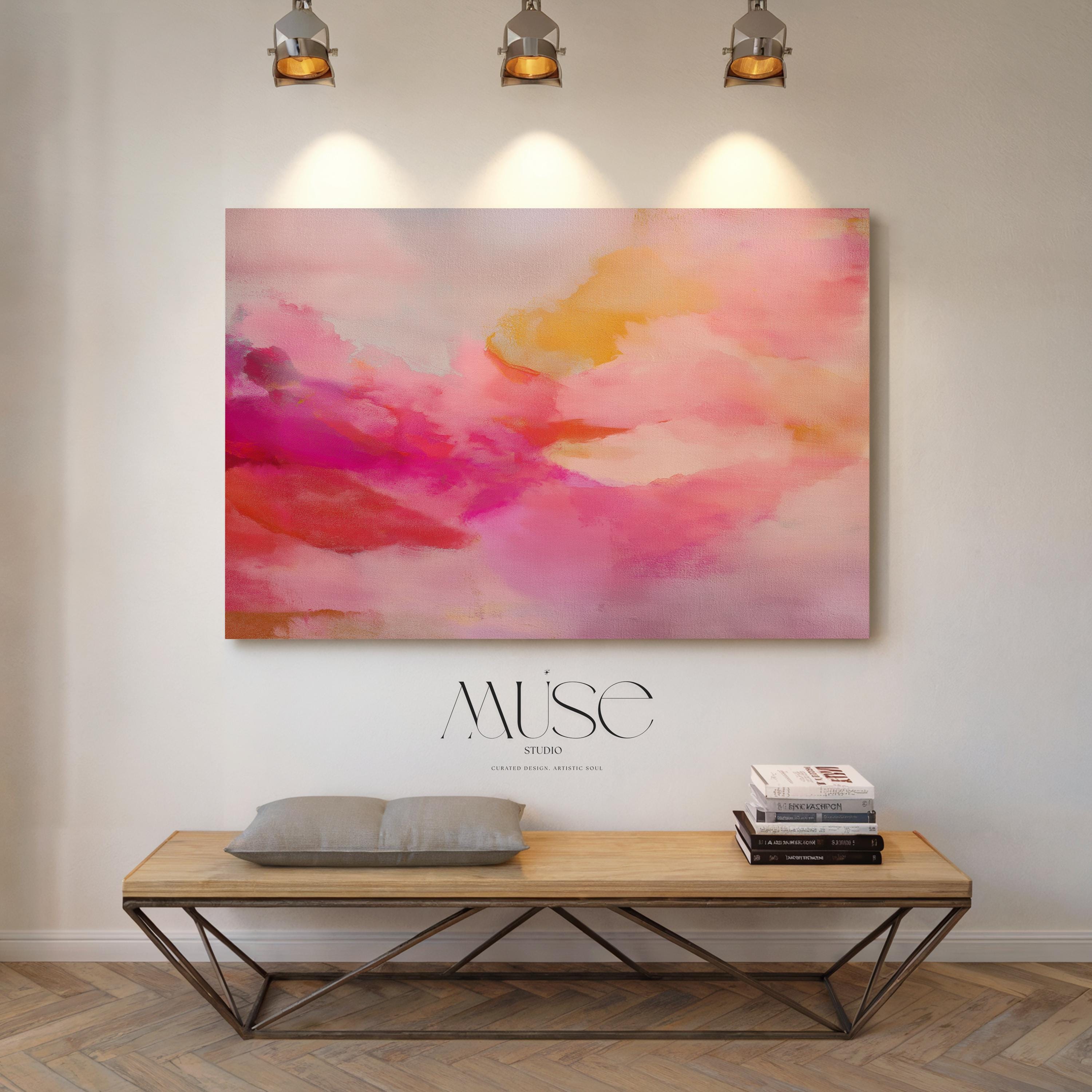 Large horizontal stretched canvas wall art in soft pink, golden orange, and warm blush tones. Features an abstract pastel cloudscape with painterly textures. Ideal for dreamy bedrooms, cozy studios, or soft contemporary interiors. Offered as gallery-wrapped canvas or with optional wood floating frame. From the Pink & Blush Wall Art collection by Muse Studio. Available in multiple large-format sizes for statement decor.