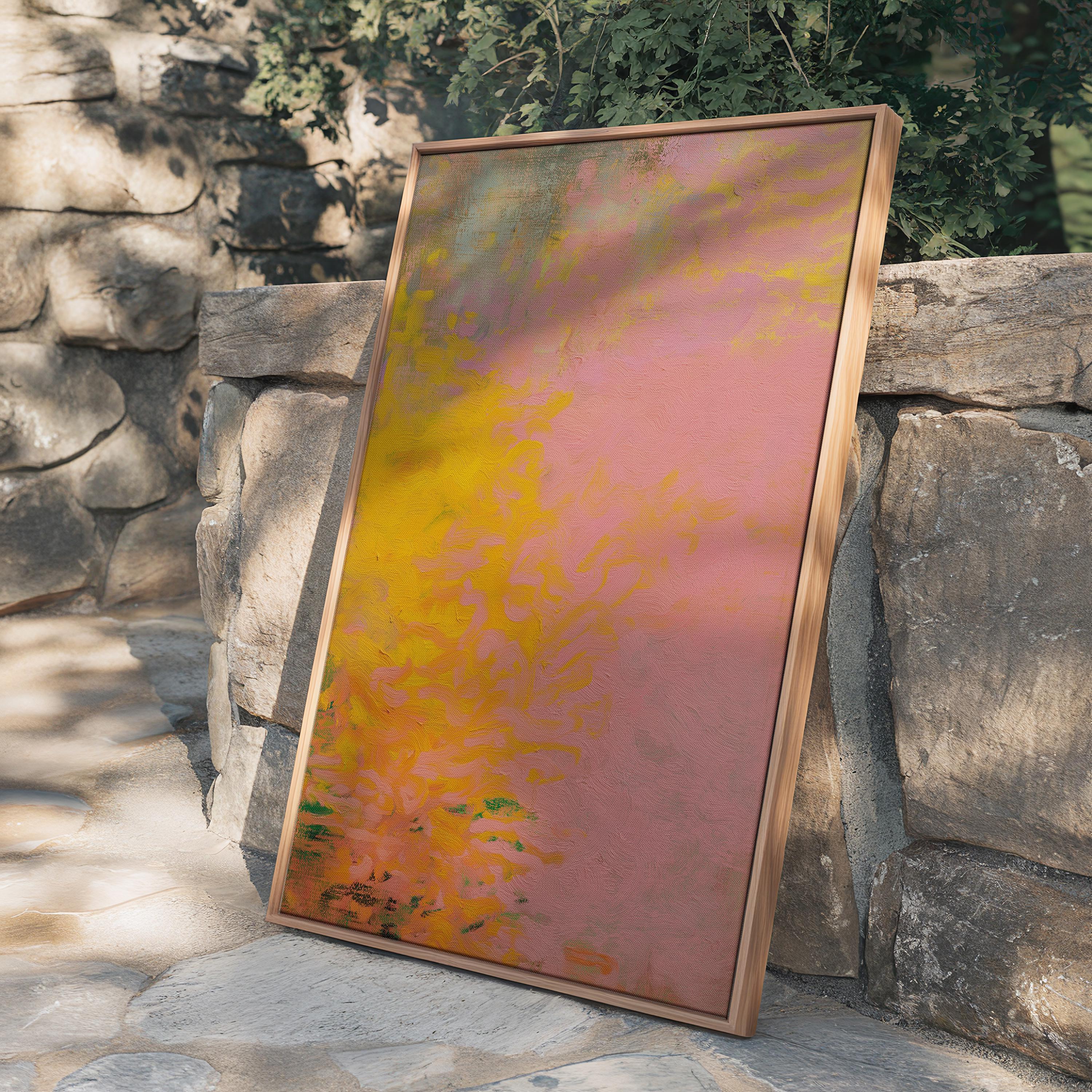 Vertical framed canvas wall art featuring a bold abstract blend of pink, orange, and yellow tones. The textured gradient evokes sunset warmth and modern earthiness, styled here in a neutral living room with wood furniture, clean lines, and soft minimal accents. Ideal for entryways, minimalist interiors, or natural modern decor spaces seeking a colorful yet refined focal piece.