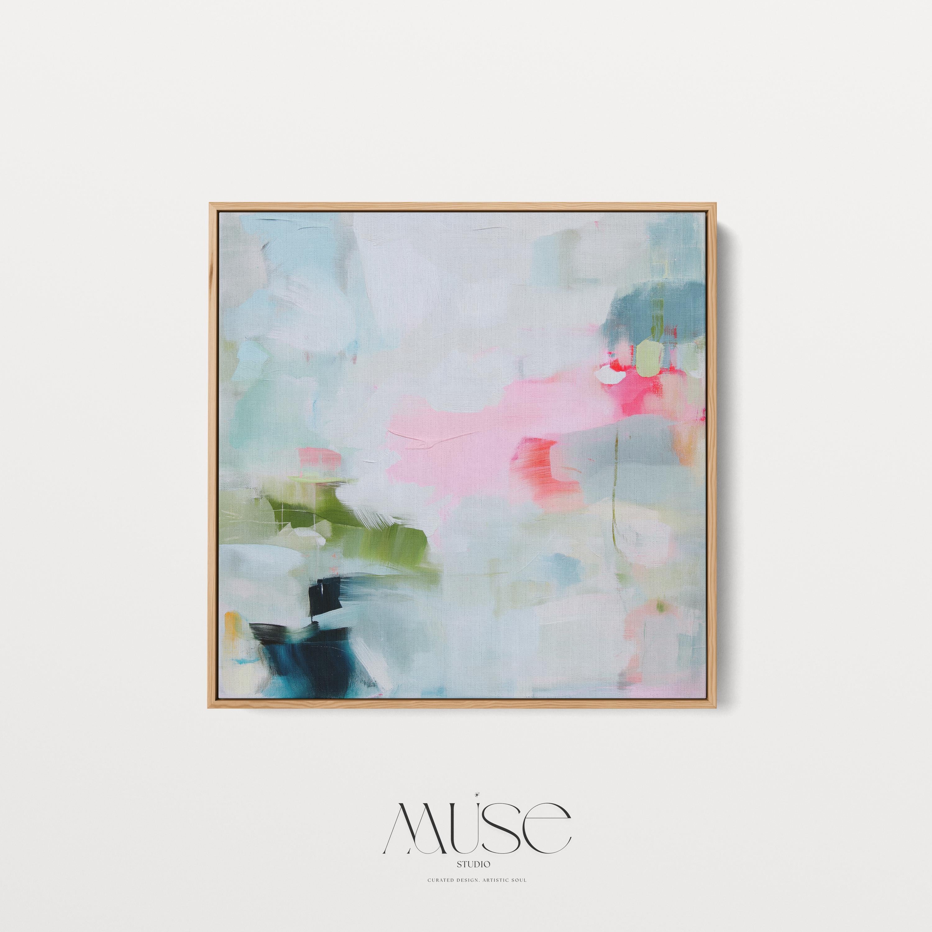 Framed abstract canvas wall art in blush pink, blue, green, and soft neutral tones. Square modern painting with expressive brushstrokes and light color palette. Ideal for bedrooms, home offices, or styled spaces seeking a feminine and fresh decor piece. Presented in a natural wood frame, this soft contemporary artwork adds gentle movement and colorful balance to curated interiors. A Muse Studio original designed for designer-led spaces.
