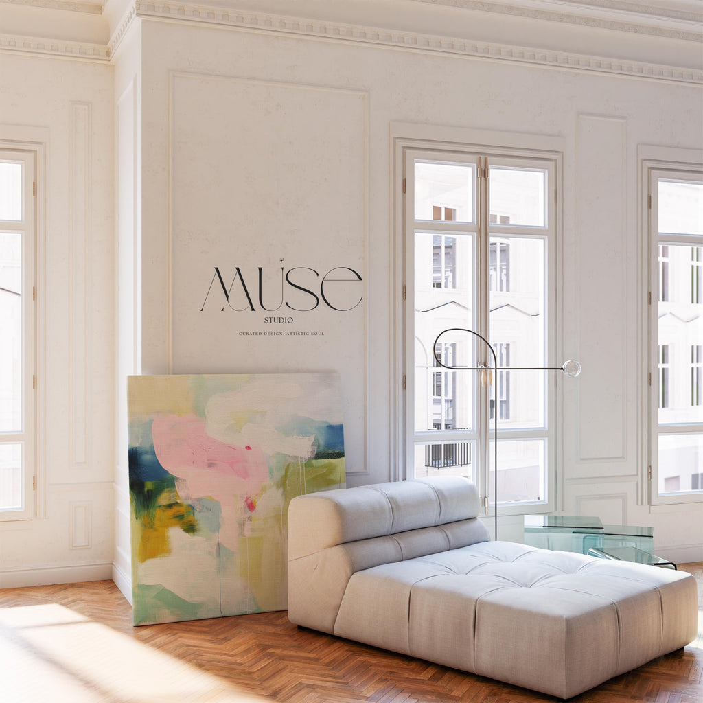 Muse Studio Aurora Muse 485 soft blue and blush abstract wall art printed with museum-grade giclée inks on premium gallery-wrapped artist canvas, featuring airy layered brushwork in powder blue, muted blush, and warm undertones. Large-scale modern soft contemporary artwork styled above a linen sofa in an organic transitional living room with light oak finishes, warm white walls, and brushed brass accents, creating a calm refined focal point for elevated interiors.