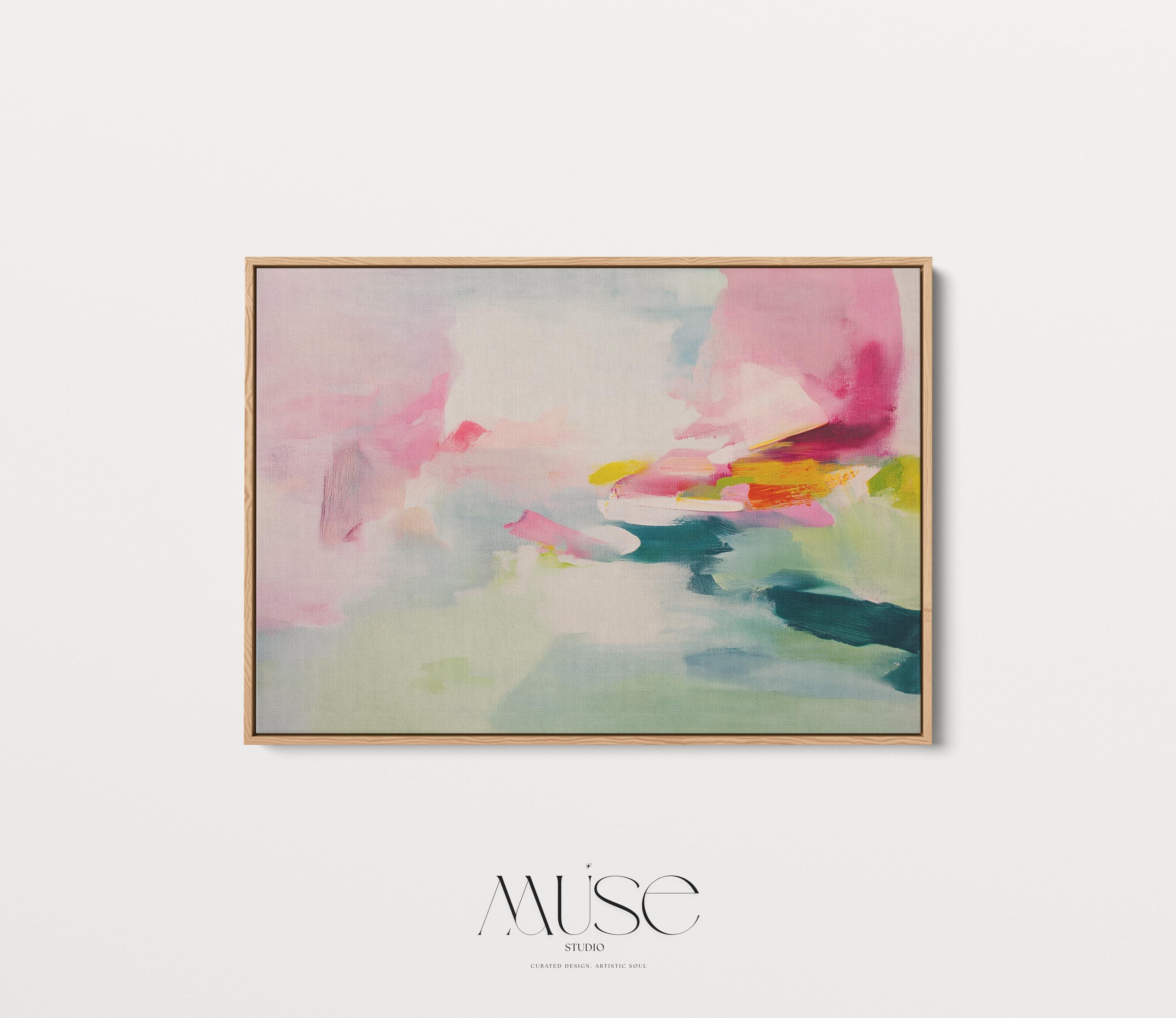 Framed canvas wall art featuring a soft abstract composition in blush pink, teal, lemon yellow, and mint green. The painting blends gentle brushstrokes and airy movement, creating a serene and modern feel. Styled in a sunlit room with warm wood tones, neutral decor, and minimalist furnishings. Perfect for bedrooms, living rooms, or contemporary interiors. Muse Studio artwork designed for curated home decor with a soft contemporary aesthetic.