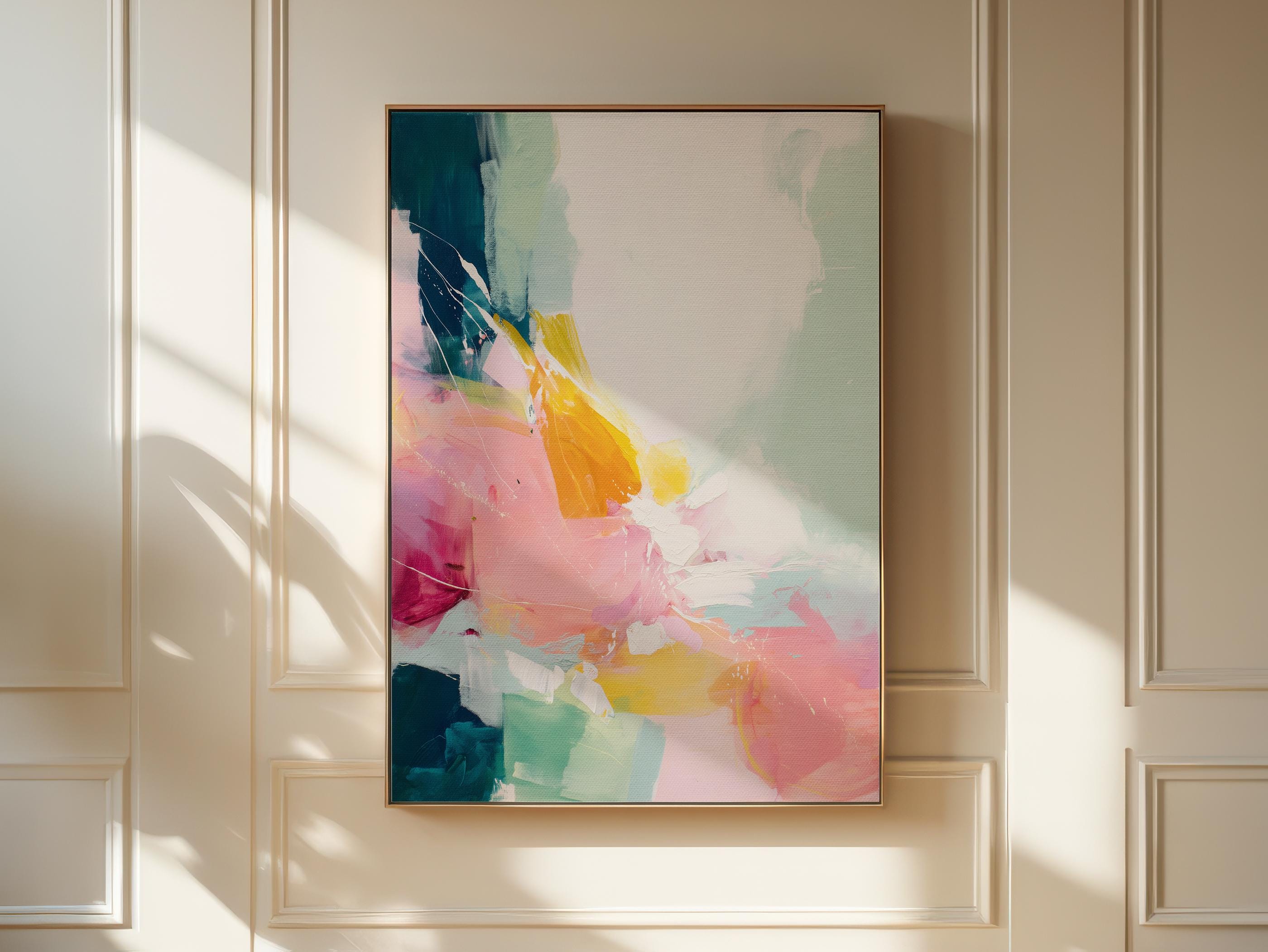 Large vertical framed canvas wall art featuring expressive abstract brushstrokes in pink, teal, yellow, and green. The painting hangs in a softly lit designer space with neutral panel walls and elegant molding, styled for bedroom, hallway, or modern entryway decor. Part of the Color Pop and Soft Contemporary collection from Muse Studio.