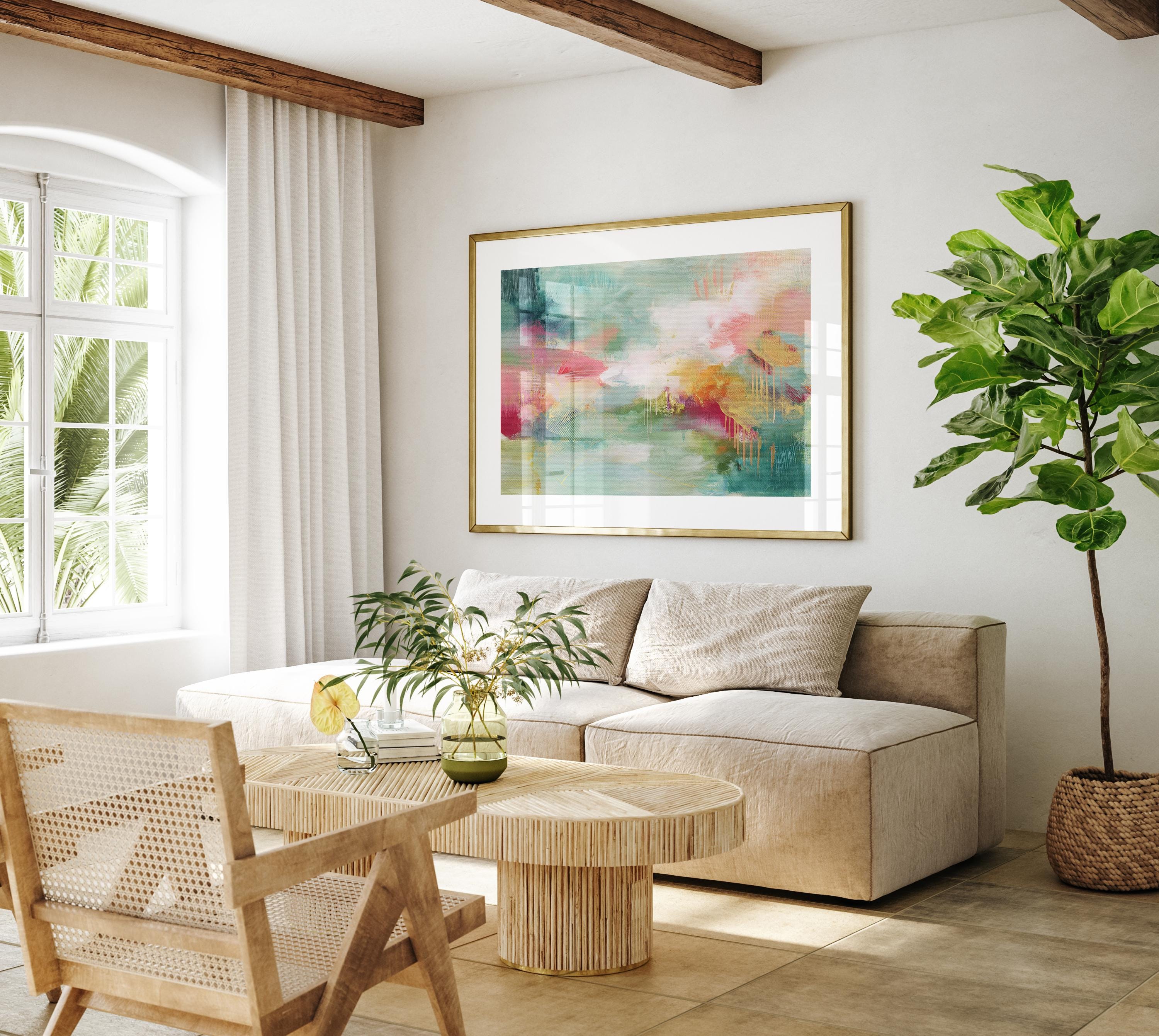 Fine art poster print of a horizontal abstract painting in blush pink, sage green, and warm golden tones. This boho-style wall art is printed on archival fine art paper with giclée quality for vibrant color and texture. Perfect for bedrooms, creative studios, or laid-back bohemian interiors. The artwork’s expressive brushstrokes and rich palette bring soft vibrancy to relaxed spaces. Muse Studio curated boutique decor.