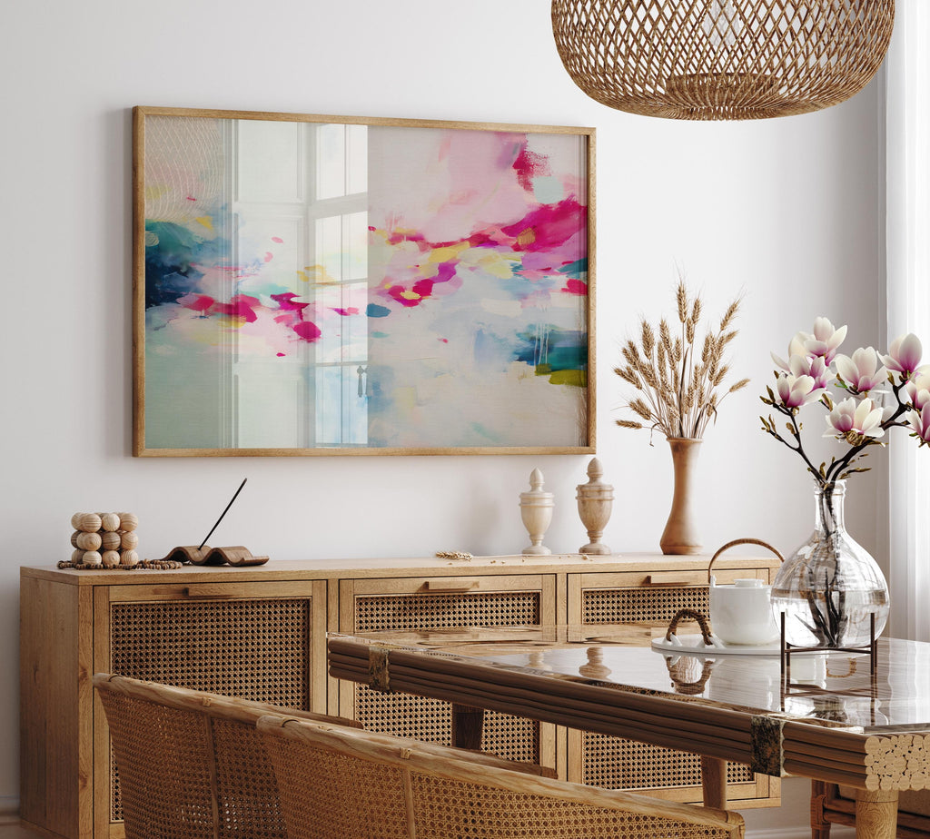 Horizontal abstract artwork in blush pink, magenta, lemon yellow, soft mint, and navy, layered over a pale ivory background with painterly brushstrokes and expressive movement. The soft color transitions and energetic drips reflect a modern, boho-inspired style. Ideal for soft contemporary, dopamine decor, and feminine interior trends, this piece brings a joyful, curated vibe to bedrooms, creative studios, or styled living rooms.