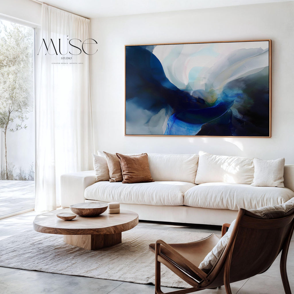 Horizontal abstract wall art in deep navy, misty teal, and soft blue tones, painted in a fluid, ocean-inspired style. Designed for moody, modern spaces and perfect for living rooms, bedrooms, or office walls. Available as a fine art poster or canvas wall art for curated, color-forward decor.