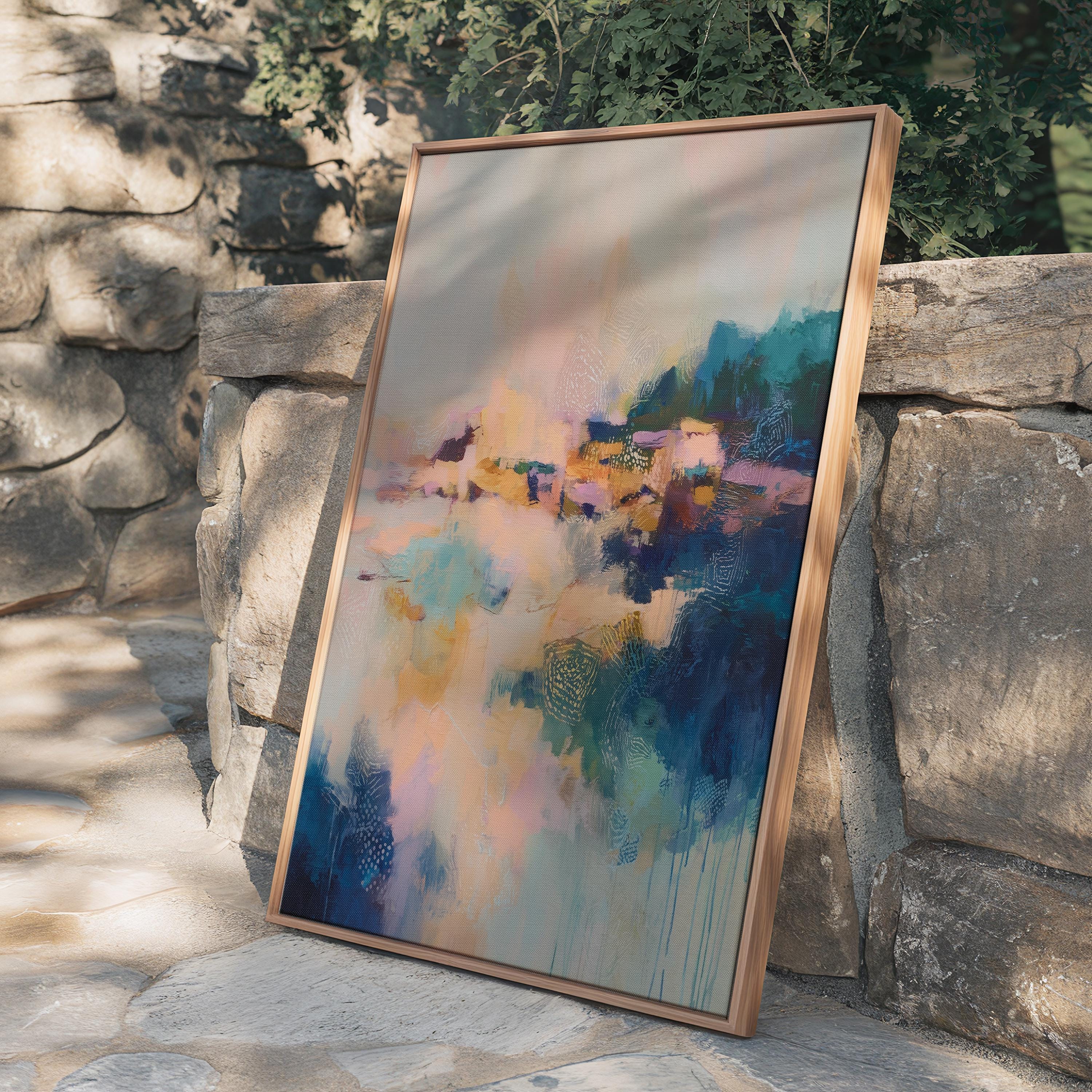 Vertical framed abstract wall art in blush, peach, teal, and navy with soft painterly textures and subtle gold undertones. Ideal for bedrooms, transitional entryways, or softly styled interiors. Available as a floating framed canvas for curated, color-forward decor.