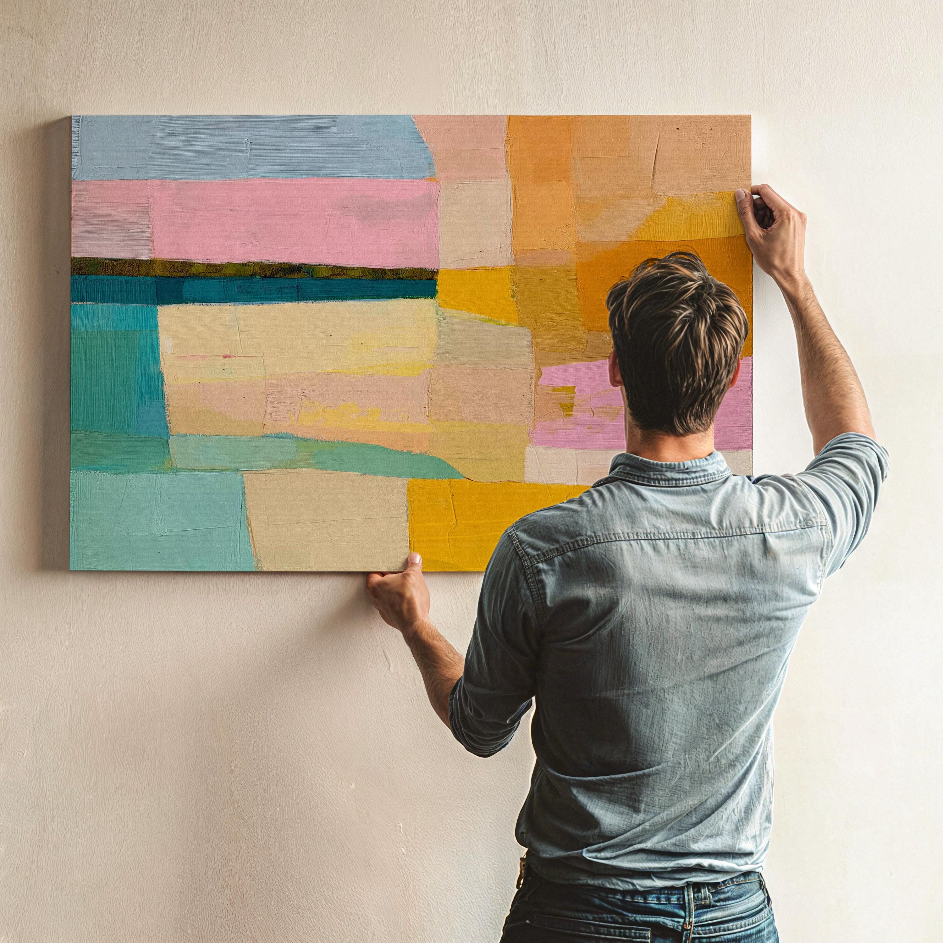 Horizontal abstract wall art with blocks of blush pink, mint green, golden yellow, and ochre in a color field style. Painted in a warm, playful palette perfect for preppy bedrooms, soft modern offices, or warm minimalist interiors. Available as a fine art poster or canvas wall art for curated, color-forward decor.