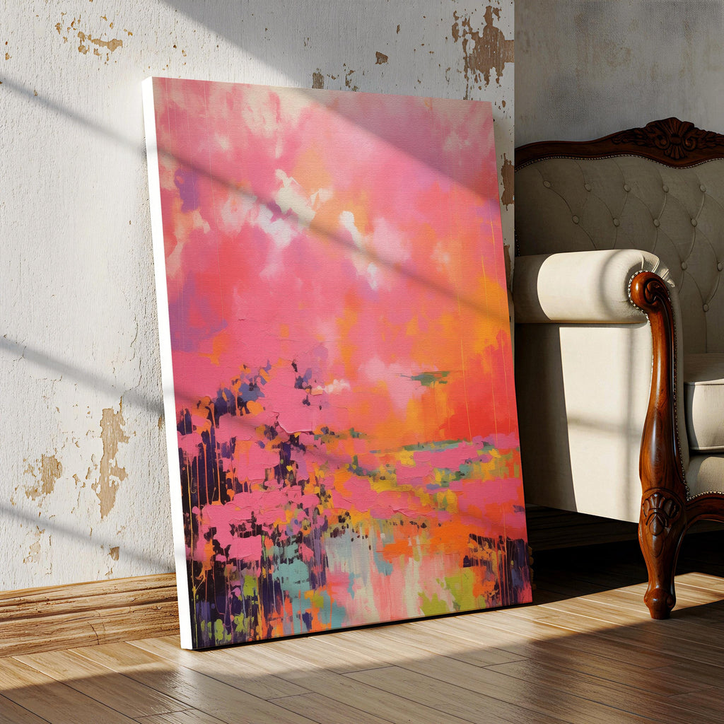 Vertical canvas wall art featuring bold sunset hues of pink, orange, coral, and lavender in a dreamy abstract landscape. Painted in expressive brushwork with glowing color fields, this piece blends beautifully with transitional or boho decor in bedrooms, entryways, or modern curated spaces. Available as a fine art poster or canvas wall art for curated, color-forward decor.