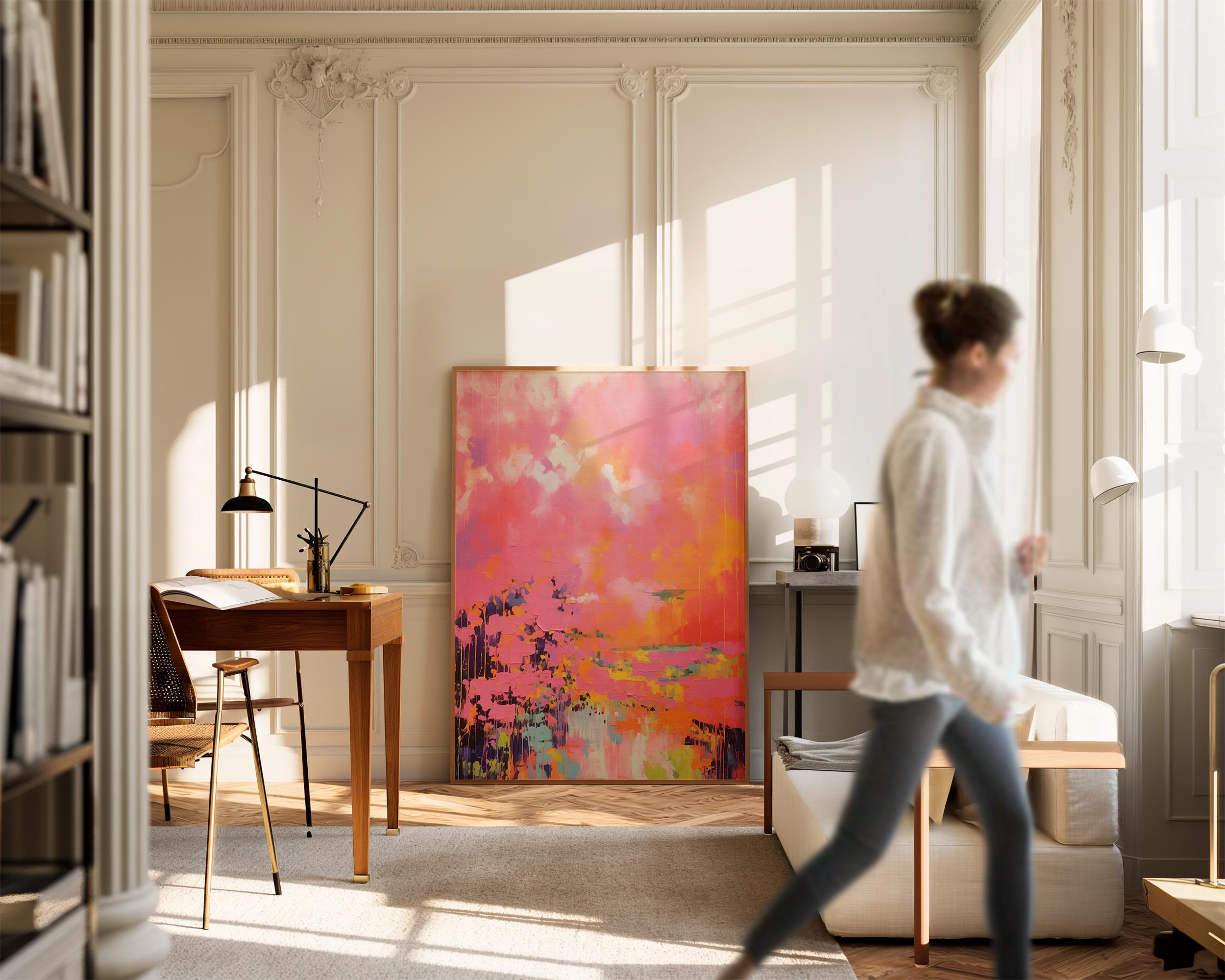 Vertical canvas wall art featuring bold sunset hues of pink, orange, coral, and lavender in a dreamy abstract landscape. Painted in expressive brushwork with glowing color fields, this piece blends beautifully with transitional or boho decor in bedrooms, entryways, or modern curated spaces. Available as a fine art poster or canvas wall art for curated, color-forward decor.