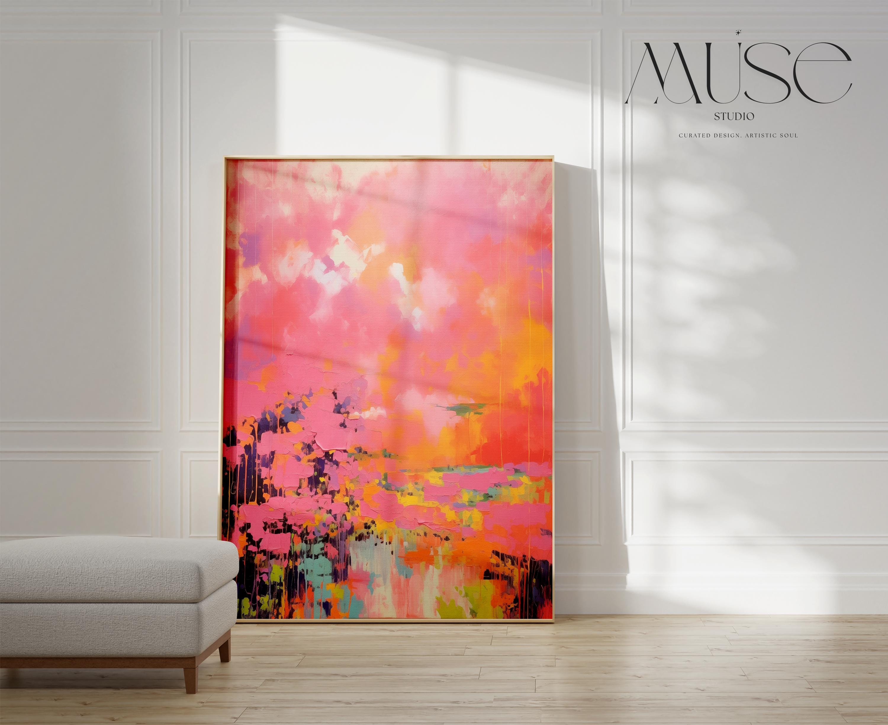 Vertical canvas wall art featuring bold sunset hues of pink, orange, coral, and lavender in a dreamy abstract landscape. Painted in expressive brushwork with glowing color fields, this piece blends beautifully with transitional or boho decor in bedrooms, entryways, or modern curated spaces. Available as a fine art poster or canvas wall art for curated, color-forward decor.