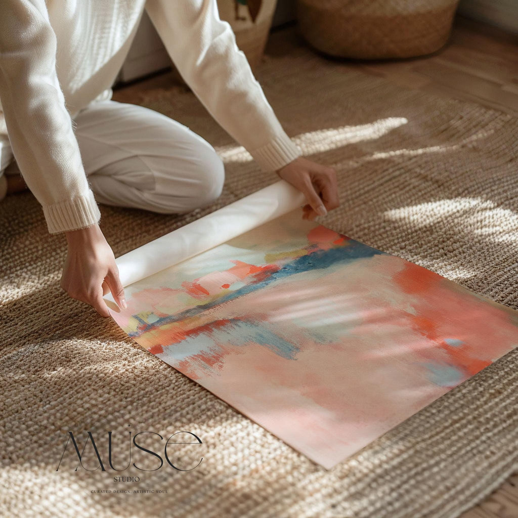 Abstract landscape canvas art featuring coral, soft blush, and blue tones in a peaceful painterly composition. Inspired by nature’s horizon, this vertical piece pairs beautifully with transitional, boho, or serene bedroom decor. Available as a fine art poster or canvas wall art for curated, color-forward decor.