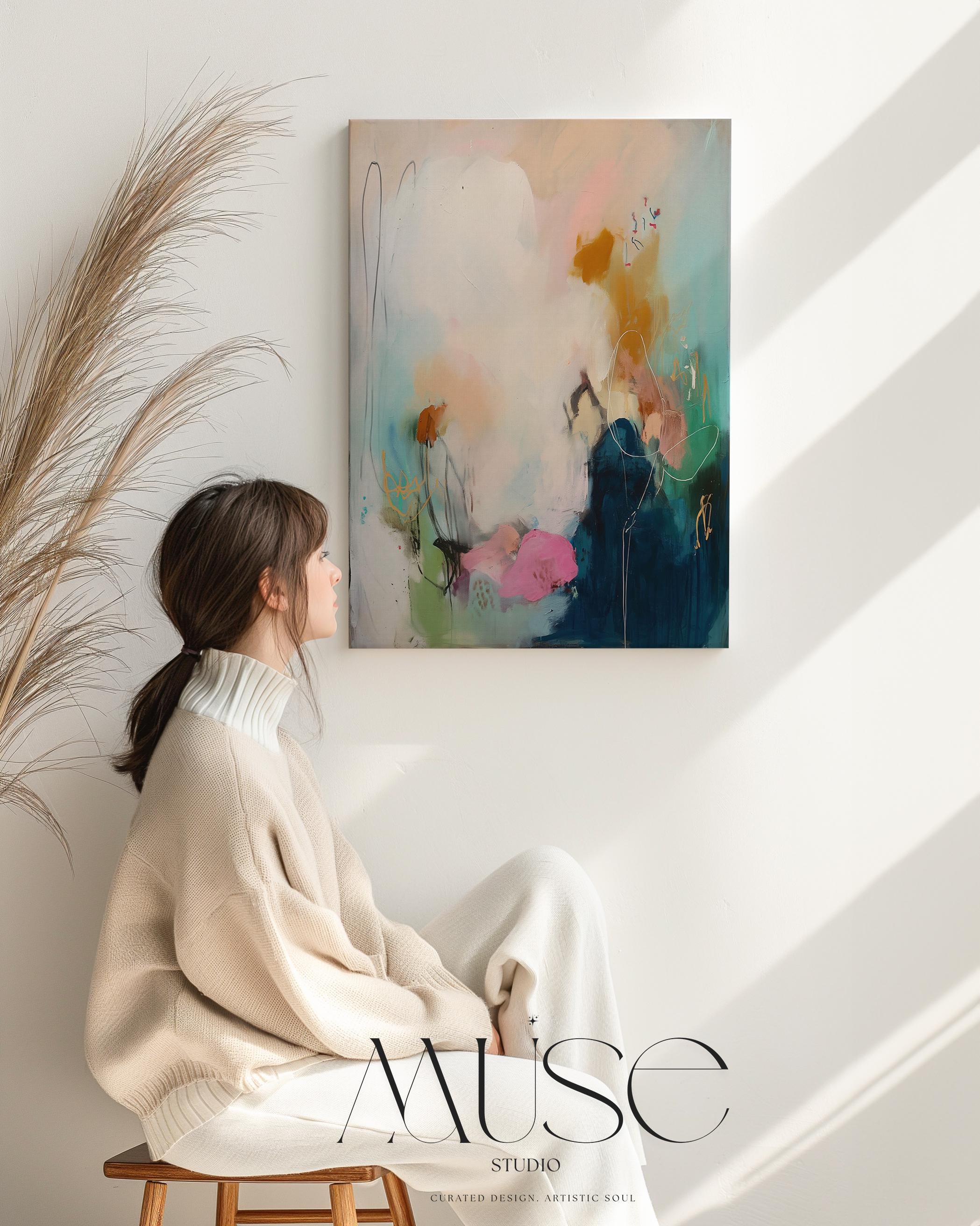 Vertical abstract wall art in moody tones of deep blue, blush pink, and ochre gold, painted in a softly layered style with expressive flow. Perfect for transitional or soft contemporary decor, adding depth to bedrooms, entryways, or calm living spaces. Available as a fine art poster or canvas wall art for curated, color-forward decor.