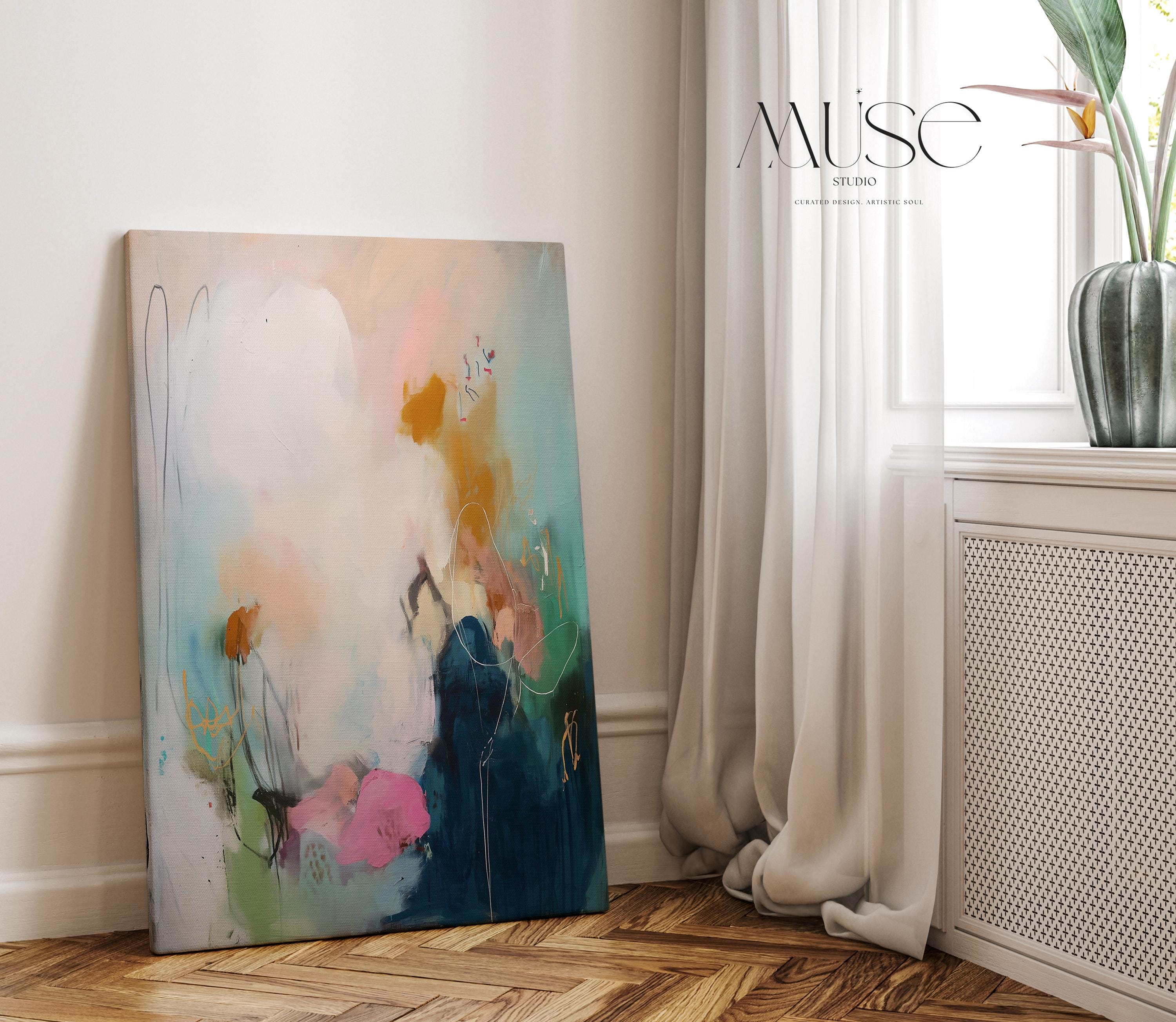 Vertical abstract wall art in moody tones of deep blue, blush pink, and ochre gold, painted in a softly layered style with expressive flow. Perfect for transitional or soft contemporary decor, adding depth to bedrooms, entryways, or calm living spaces. Available as a fine art poster or canvas wall art for curated, color-forward decor.