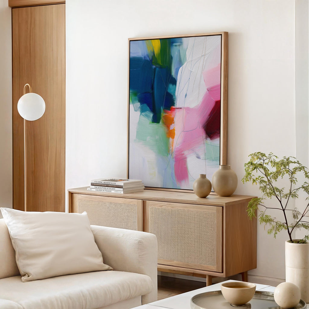 Framed vertical abstract canvas in a bold preppy style with rich navy, blush pink, coral orange, and soft mint. Contemporary painterly texture with expressive brushwork and linear detailing. Ideal for interior designers and stylists seeking statement wall art with a fresh, high-contrast palette. Vertical format styled for modern bedrooms, offices, or boutique interiors.