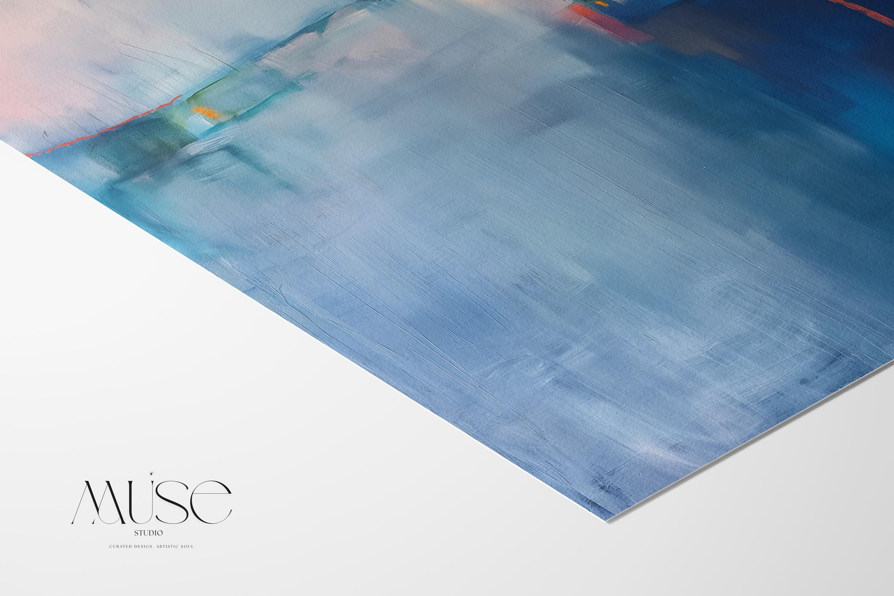 Square framed canvas wall art featuring a moody abstract landscape in rich blue, indigo, blush, and coral tones. This modern piece adds emotional depth and painterly texture to any room. Ideal for coastal interiors, minimalist spaces, or moody decor palettes. Framed in natural wood and displayed on a clean white wall, perfect for offices, living rooms, or curated art walls. Muse Studio original design for refined home styling.