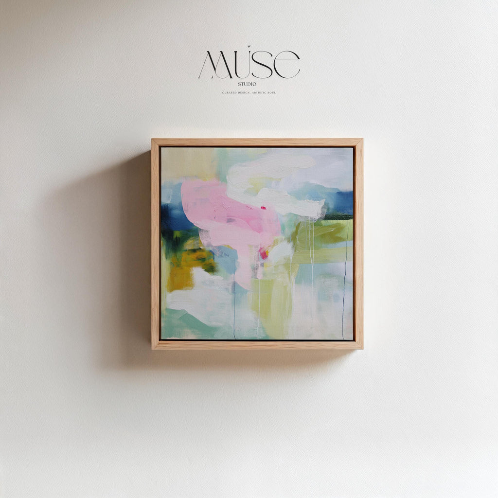 Muse Studio Aurora Muse 485 soft blue and blush abstract wall art printed with museum-grade giclée inks on premium gallery-wrapped artist canvas, featuring airy layered brushwork in powder blue, muted blush, and warm undertones. Large-scale modern soft contemporary artwork styled above a linen sofa in an organic transitional living room with light oak finishes, warm white walls, and brushed brass accents, creating a calm refined focal point for elevated interiors.