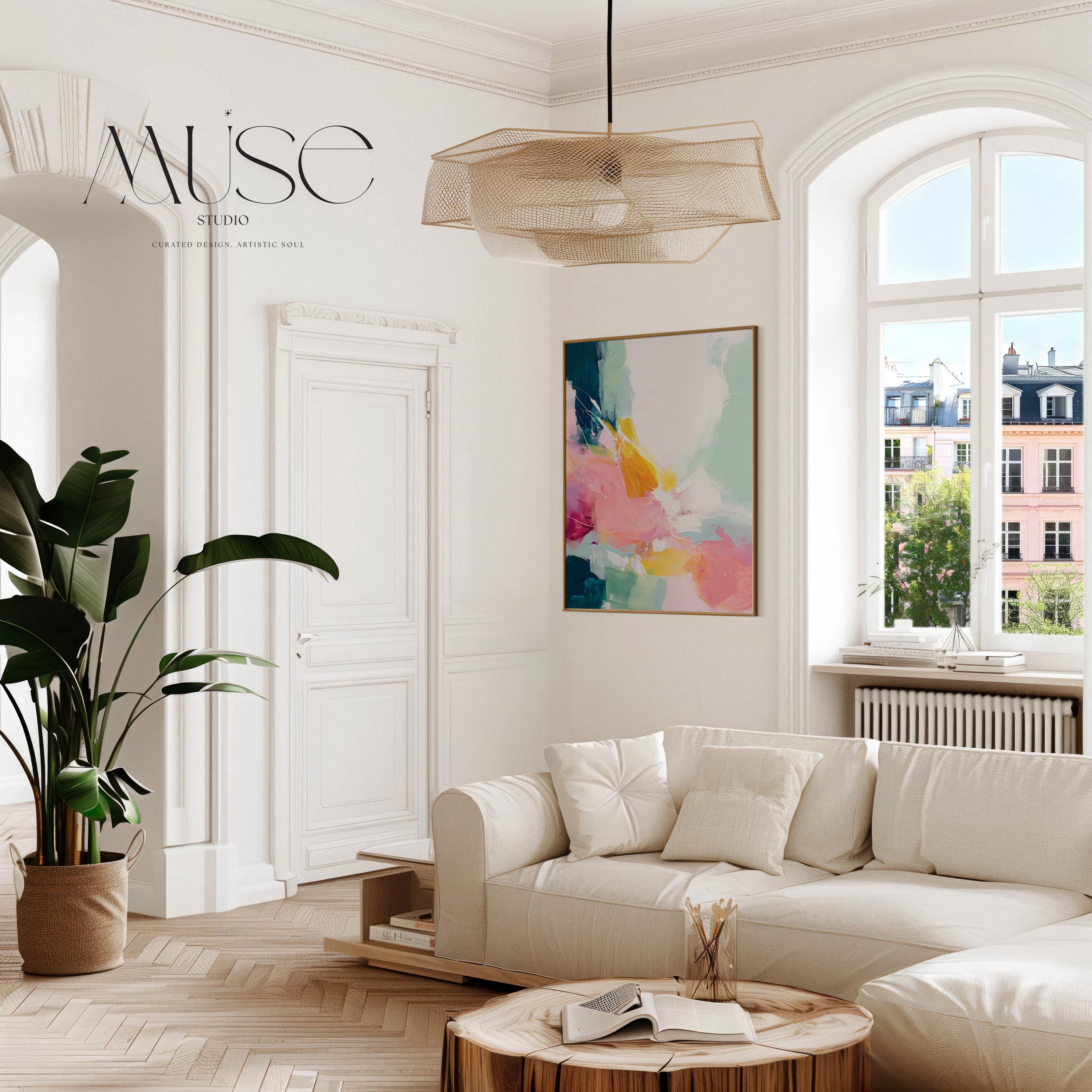 Large vertical framed canvas wall art featuring expressive abstract brushstrokes in pink, teal, yellow, and green. The painting hangs in a softly lit designer space with neutral panel walls and elegant molding, styled for bedroom, hallway, or modern entryway decor. Part of the Color Pop and Soft Contemporary collection from Muse Studio.