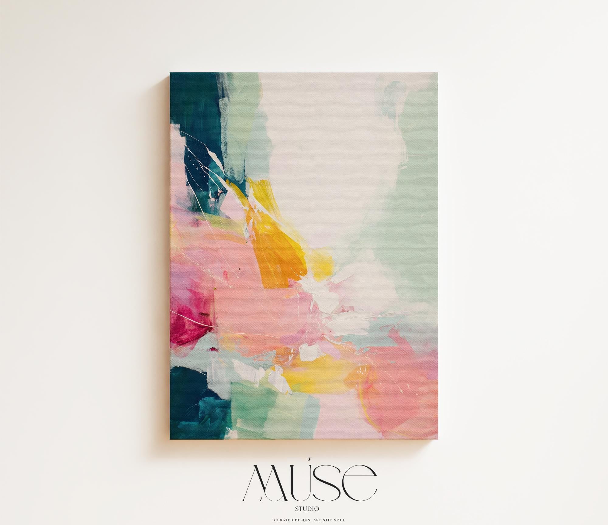 Vertical abstract wall art with soft contemporary styling, featuring bold strokes of pink, coral, teal, yellow, and soft mint green. The vibrant yet airy composition is printed on a high-quality canvas, displayed against a clean white wall in natural light. This color pop artwork from Muse Studio brings energetic movement and a modern touch to curated interiors, perfect for bedrooms, entryways, or stylish living spaces.