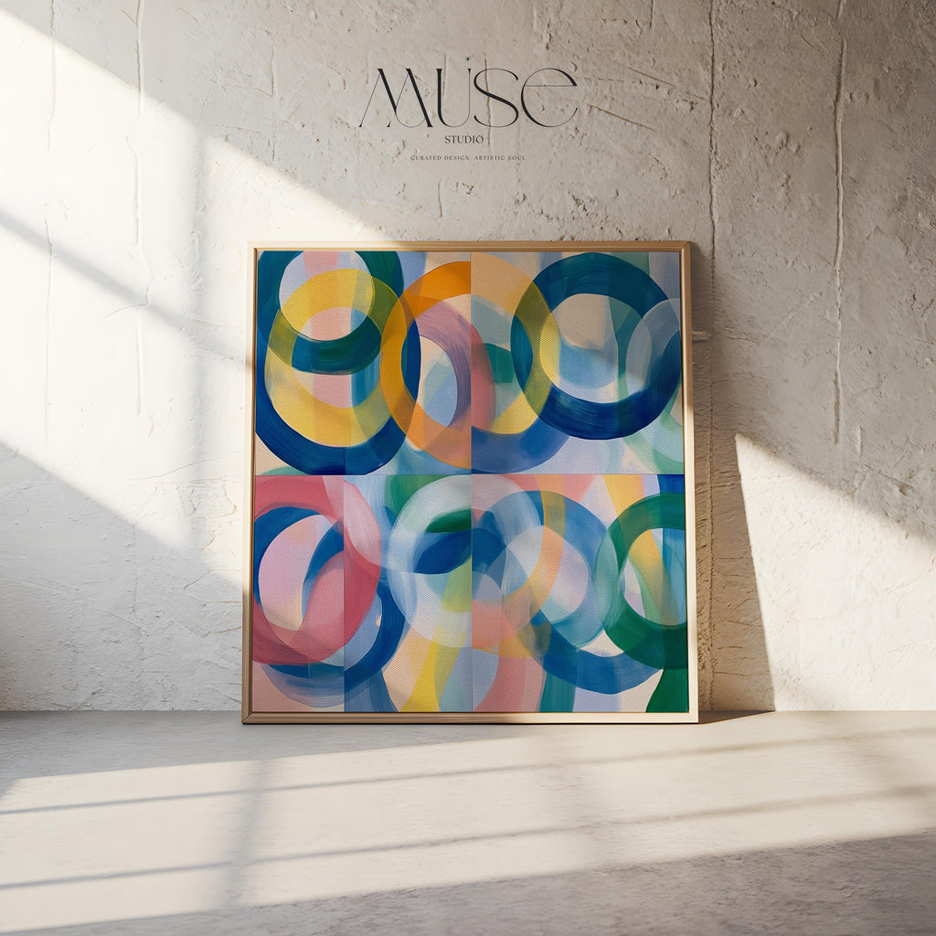 Framed square abstract canvas print featuring a colorful quadrant of overlapping circles in navy, yellow, blush, teal, and green. The geometric design and expressive brushwork create a dynamic color pop statement, ideal for eclectic interiors and bold modern walls. Available as a floating framed canvas or fine art poster for curated, color-forward decor.