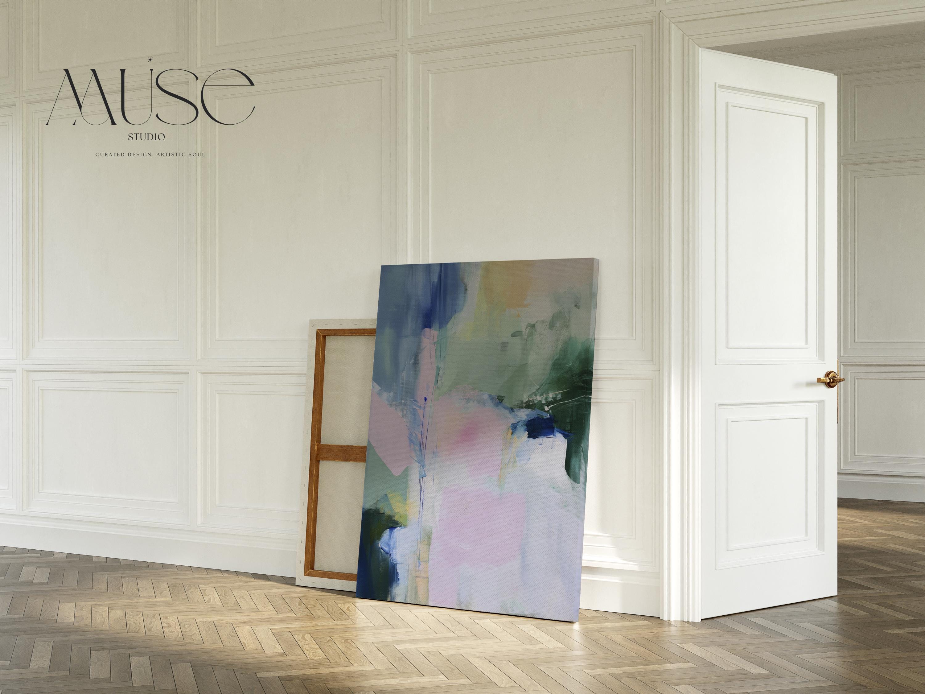 Floral abstract canvas art print by Muse Studio featuring soft blue, green, and pink botanical-inspired brushwork on premium gallery-wrapped artist canvas with museum-grade giclée inks. Vertical wall decor styled for bedrooms, living rooms, offices, nurseries, and soft pastel cottage or modern floral interiors.