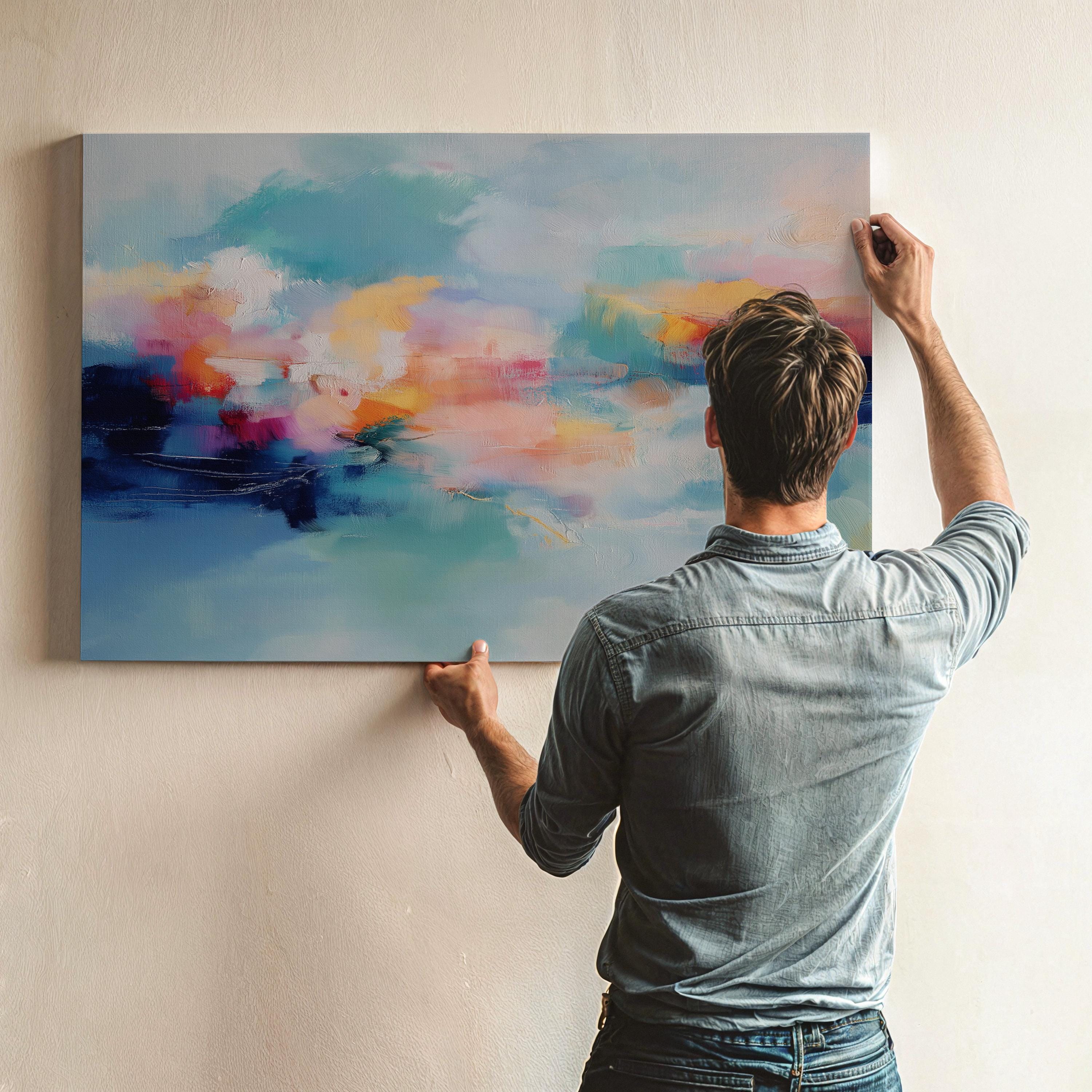 Coastal abstract canvas wall art featuring aqua blue, coral, soft peach, and cloud white. Painterly brushwork evokes ocean movement and warm light, styled for modern living rooms, spa-inspired entryways, or calm office decor. A fresh take on color pop neutrals. Available as a fine art poster or canvas wall art for curated, color-forward decor.
