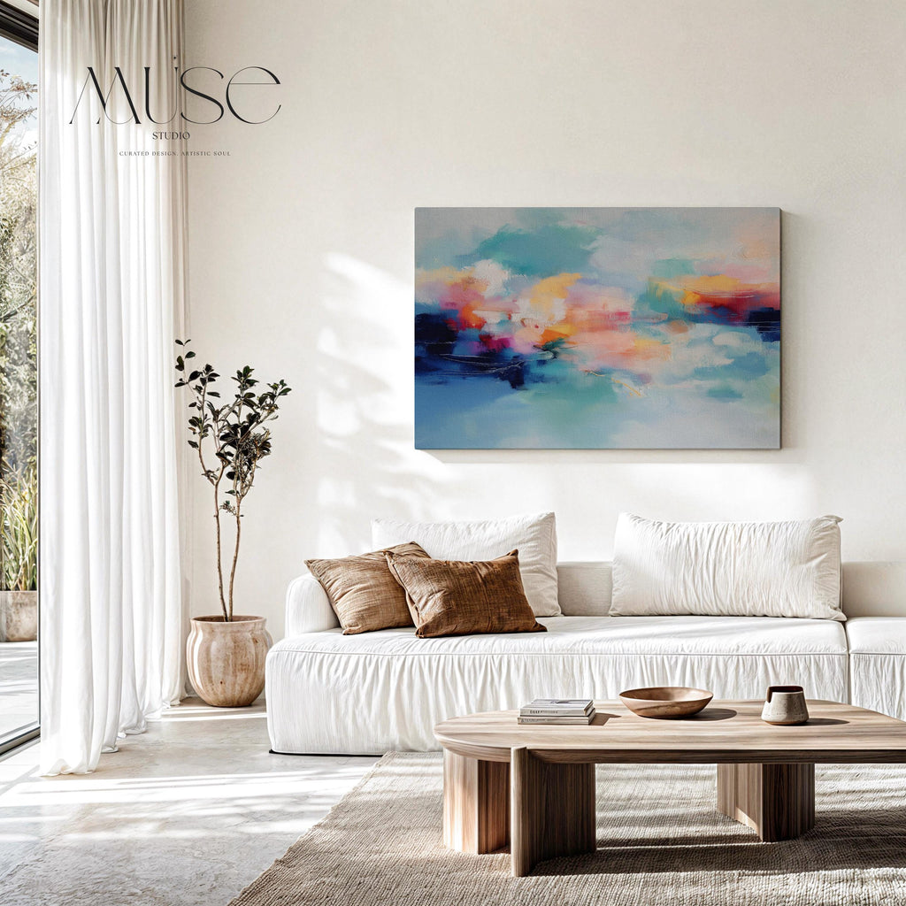 Coastal abstract canvas wall art featuring aqua blue, coral, soft peach, and cloud white. Painterly brushwork evokes ocean movement and warm light, styled for modern living rooms, spa-inspired entryways, or calm office decor. A fresh take on color pop neutrals. Available as a fine art poster or canvas wall art for curated, color-forward decor.