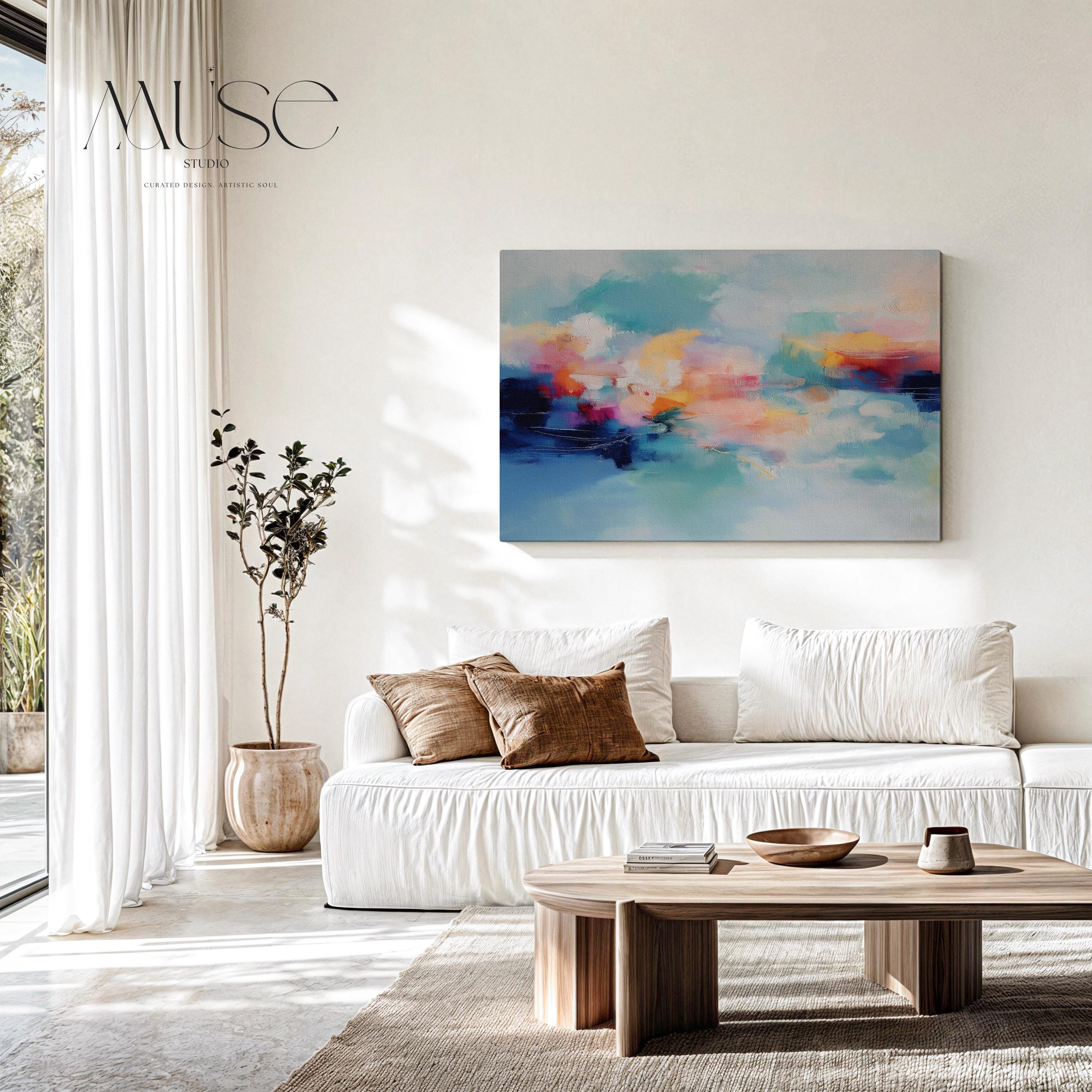 Coastal abstract canvas wall art featuring aqua blue, coral, soft peach, and cloud white. Painterly brushwork evokes ocean movement and warm light, styled for modern living rooms, spa-inspired entryways, or calm office decor. A fresh take on color pop neutrals. Available as a fine art poster or canvas wall art for curated, color-forward decor.