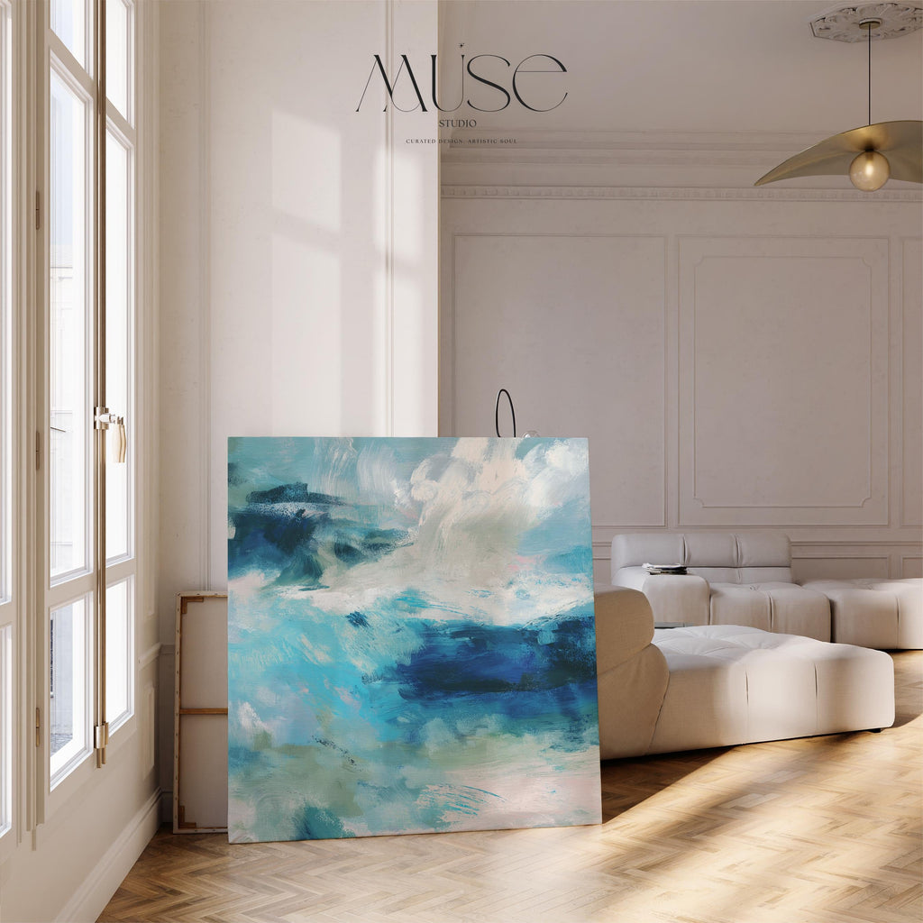 Abstract coastal wall art featuring ocean-inspired blues, sage green, and soft white brushstrokes. The textured seascape blends horizon and water with expressive movement, perfect for beach house decor, living rooms, or serene interiors. Available as a fine art poster or canvas wall art for curated, color-forward decor.
